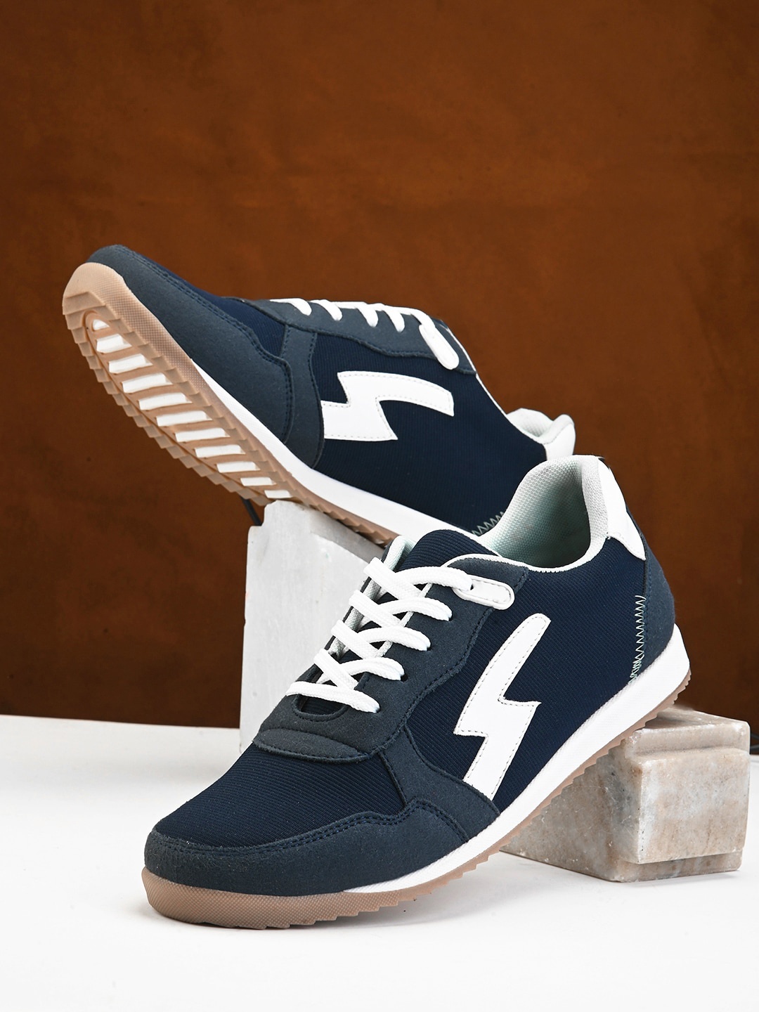 The Roadster Lifestyle Co. Men Blue Textured Comfort Insole Contrast Sole Lace-Up Sneakers
The Roadster Lifestyle Co. Men Blue Textured Comfort Insole Contrast Sole Lace-Up Sneakers