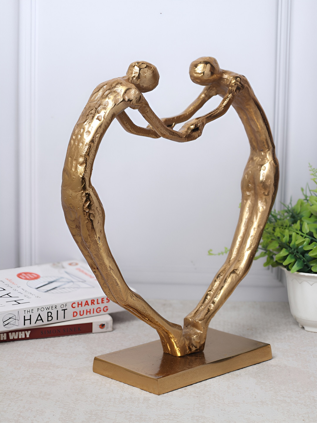 Decor de Maison Gold-Toned Large Heartfelt Harmony Sculpture Figurine Metal Showpiece
Decor de Maison Gold-Toned Large Heartfelt Harmony Sculpture Figurine Metal Showpiece