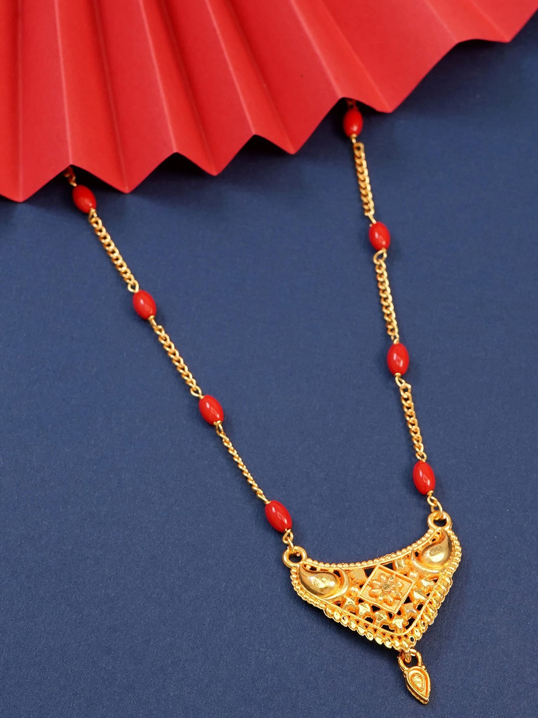 Ramdev Art Fashion Jwellery Gold-Plated Artificial Stones-Studded & Beaded Mangalsutra
Ramdev Art Fashion Jwellery Gold-Plated Artificial Stones-Studded & Beaded Mangalsutra