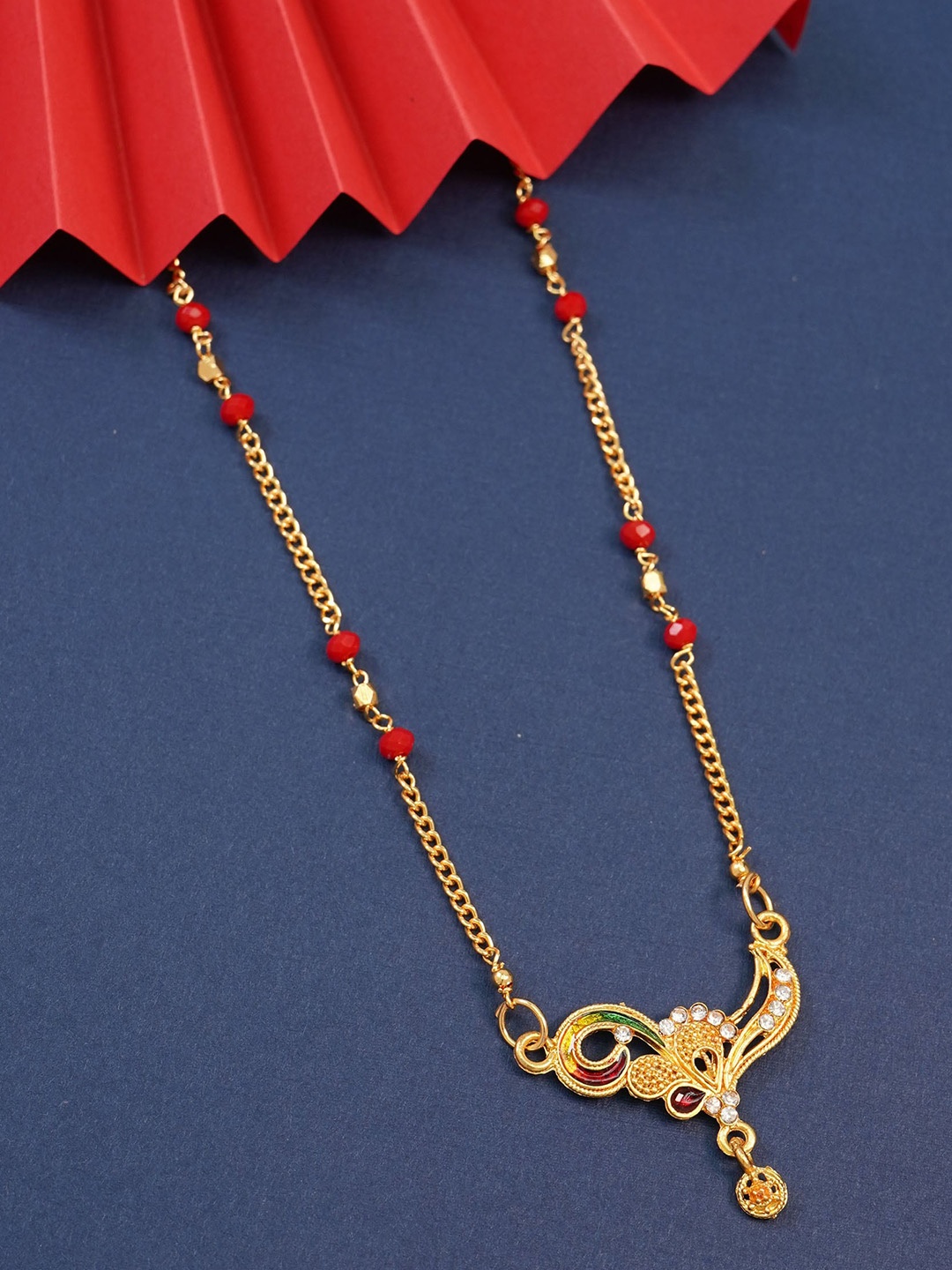 Ramdev Art Fashion Jwellery Gold-Plated Artificial Stones and Beads Mangalsutra
Ramdev Art Fashion Jwellery Gold-Plated Artificial Stones and Beads Mangalsutra