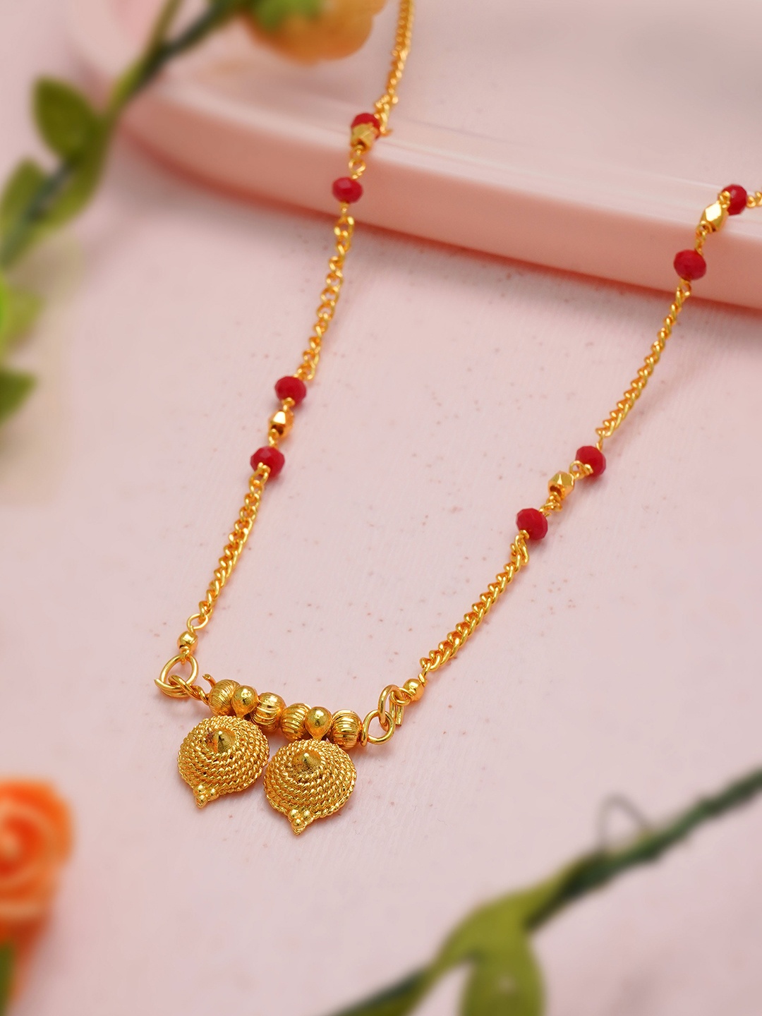 Ramdev Art Fashion Jwellery Gold-Plated Artificial Stones-Studded & Beaded Mangalsutra
Ramdev Art Fashion Jwellery Gold-Plated Artificial Stones-Studded & Beaded Mangalsutra