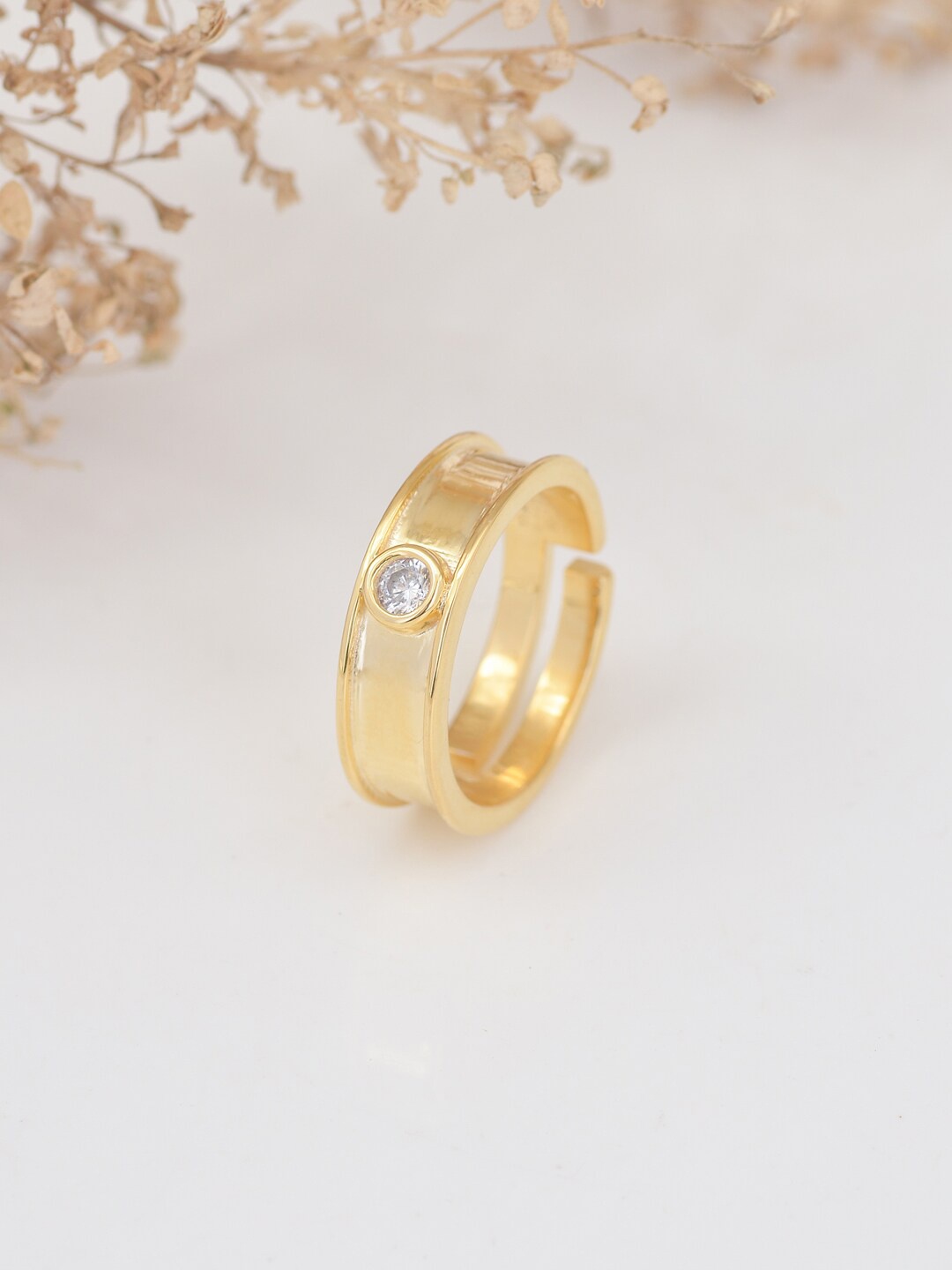 Ornate Jewels 18K Gold Plated American Diamond Solitaire Adjustable Ring for Women
Ornate Jewels 18K Gold Plated American Diamond Solitaire Adjustable Ring for Women