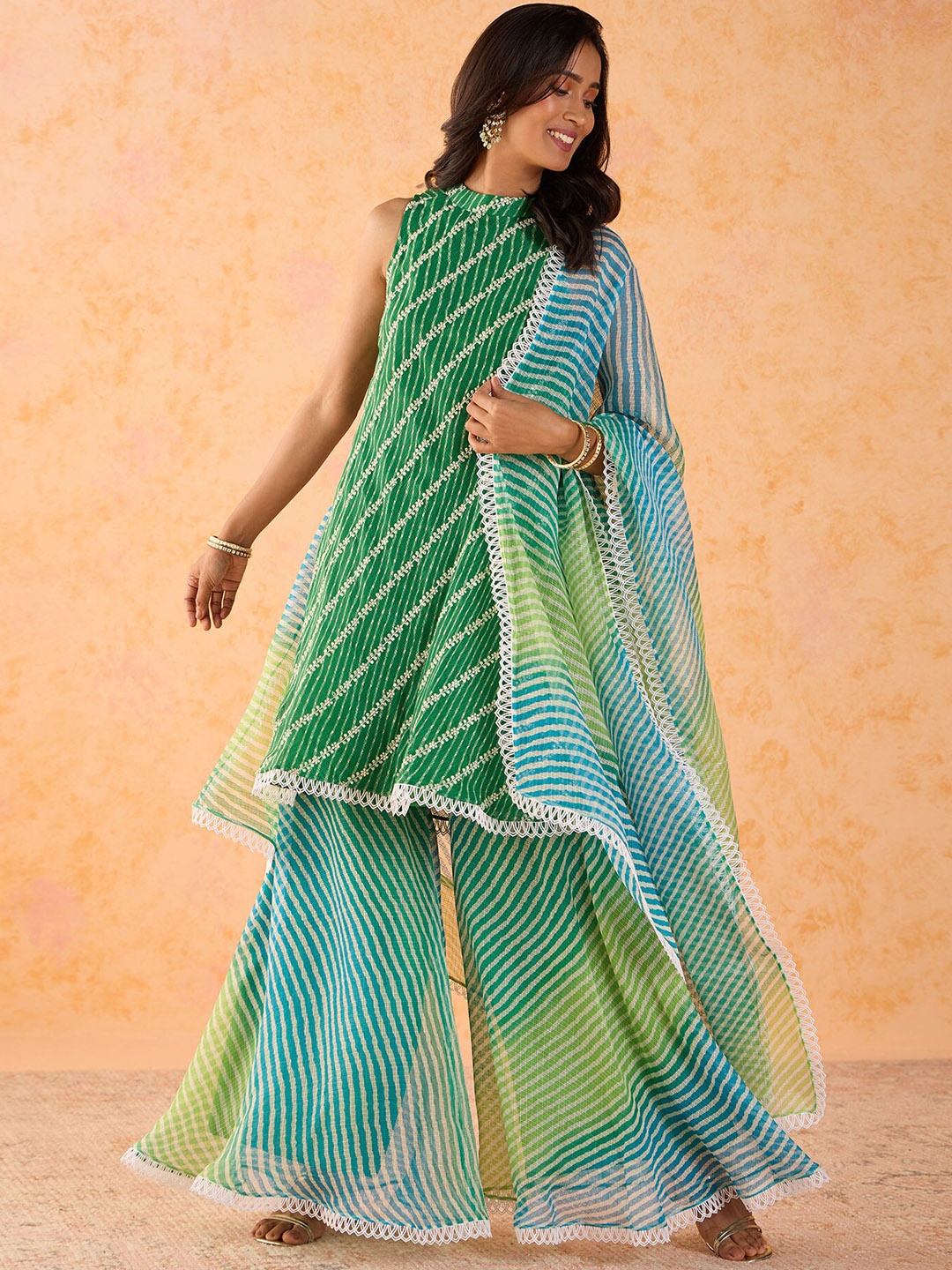 Gajra Gang Women Leheriya Embroidered Regular Sequinned Pure Cotton Kurta with Sharara & With Dupatta, Green
Gajra Gang Women Leheriya Embroidered Regular Sequinned Pure Cotton Kurta with Sharara & With Dupatta, Green