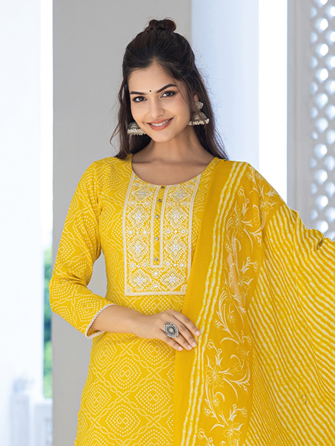 AHIKA Bandhani Printed Regular Mirror Work Straight Kurta With Trouser & Dupatta, Yellow
AHIKA Bandhani Printed Regular Mirror Work Straight Kurta With Trouser & Dupatta, Yellow