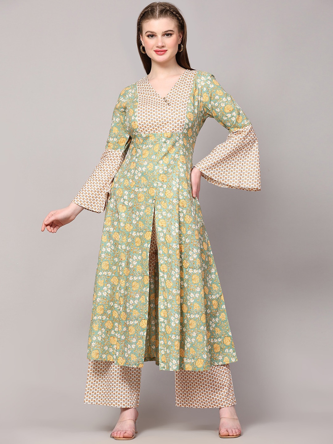 Poshak Hub Floral Printed V-Neck Bell Sleeve Pure Cotton A-Line Kurta with Palazzos, Green
Poshak Hub Floral Printed V-Neck Bell Sleeve Pure Cotton A-Line Kurta with Palazzos, Green