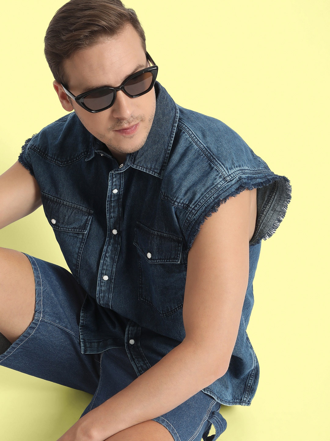Bene Kleed Spread Collar Sleeve Less Oversized Denim Shirt With Pocket Detailing, Blue
Bene Kleed Spread Collar Sleeve Less Oversized Denim Shirt With Pocket Detailing, Blue