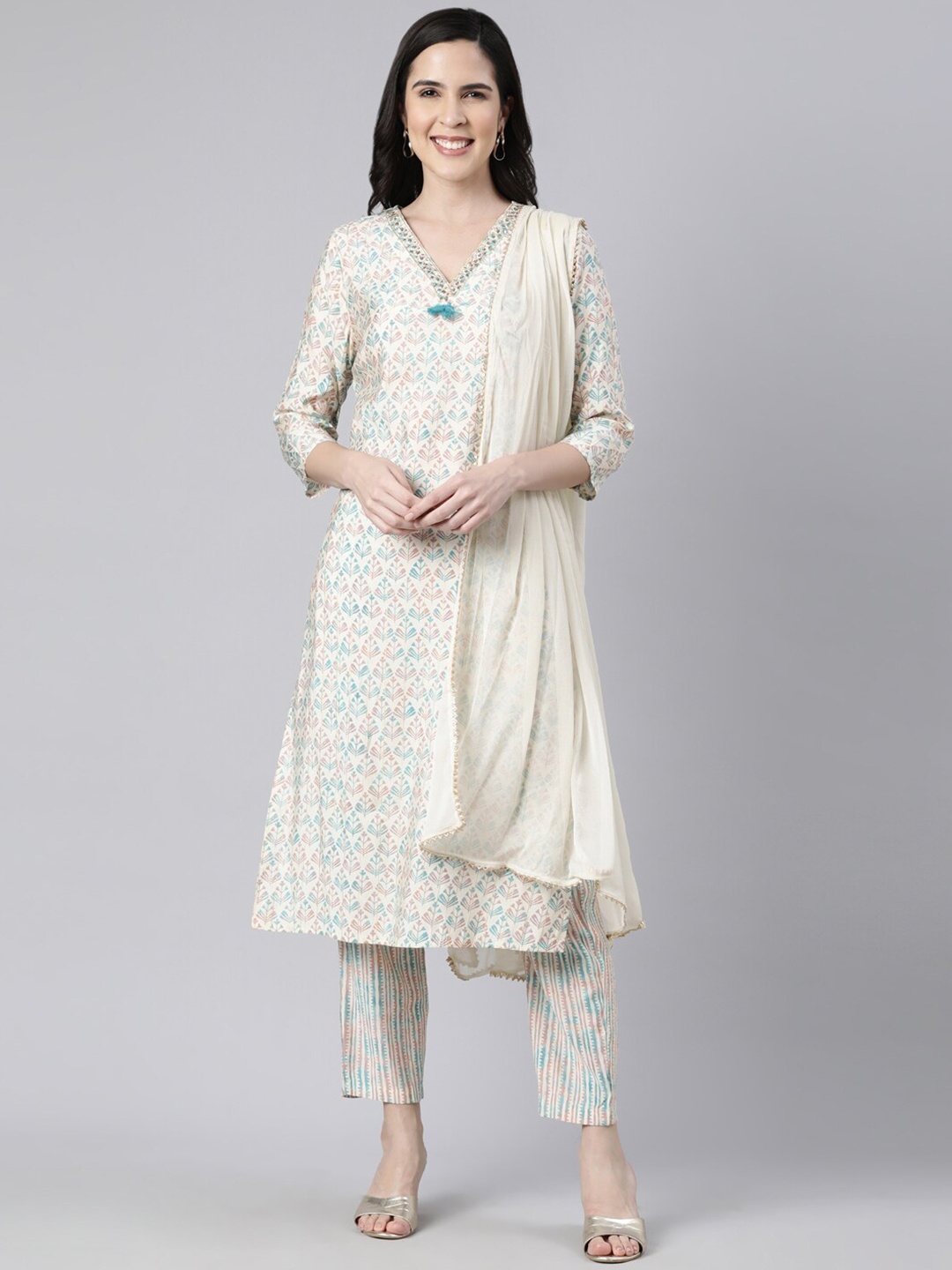 Neerus Ethnic Motifs Printed Regular Beads & Stones A-Line Kurta With Trousers & Dupatta, Beige
Neerus Ethnic Motifs Printed Regular Beads & Stones A-Line Kurta With Trousers & Dupatta, Beige