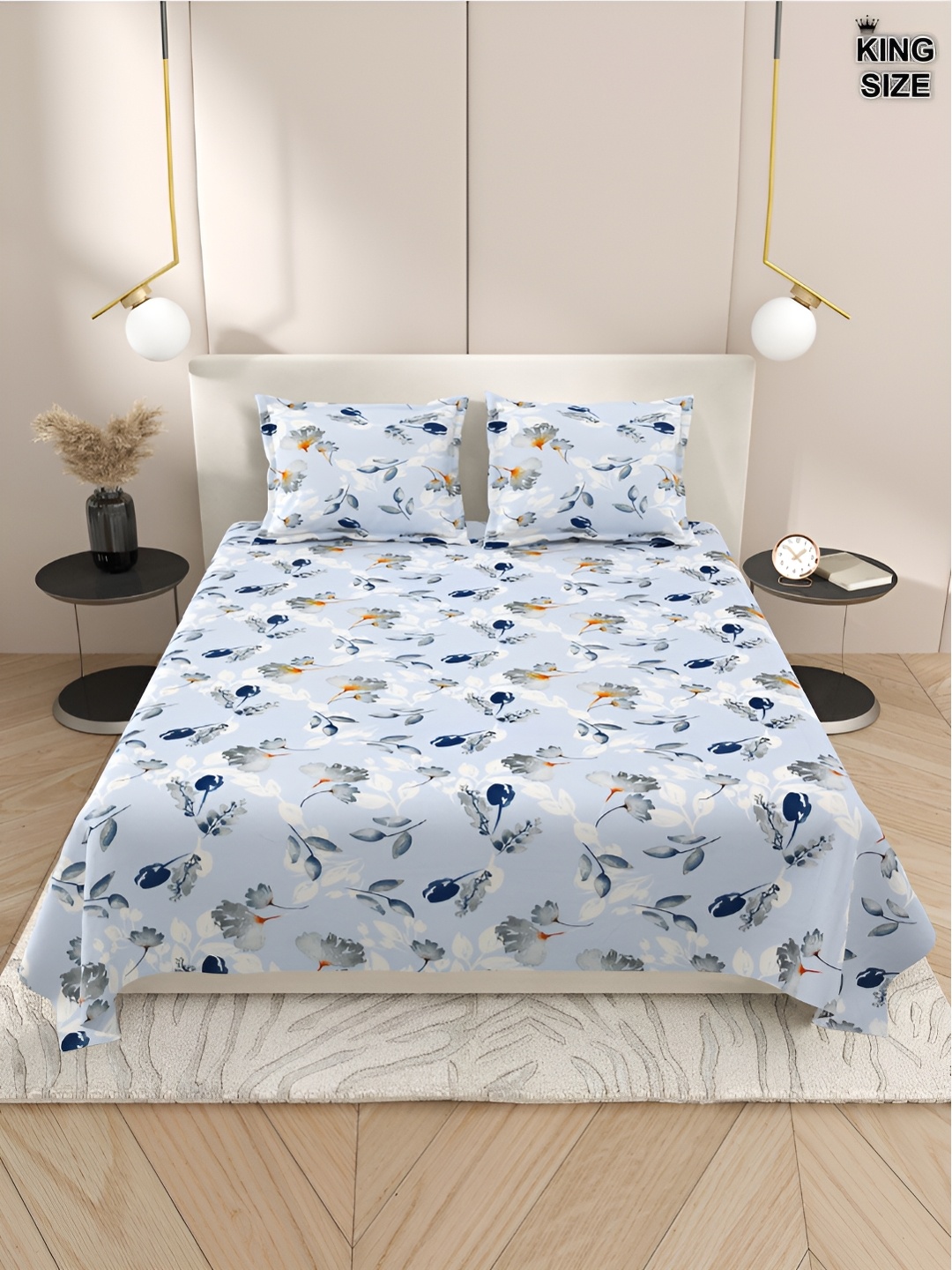 DREAM WEAVERZ Blue & White Floral Cotton 220 TC Super King Bedsheet with 2 Pillow Covers
DREAM WEAVERZ Blue & White Floral Cotton 220 TC Super King Bedsheet with 2 Pillow Covers