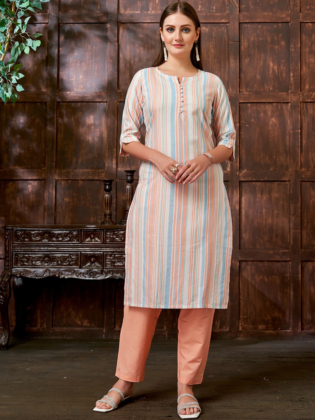 KALINI Women Striped Printed Notch Neck Straight Kurta With Trouser, Peach
KALINI Women Striped Printed Notch Neck Straight Kurta With Trouser, Peach