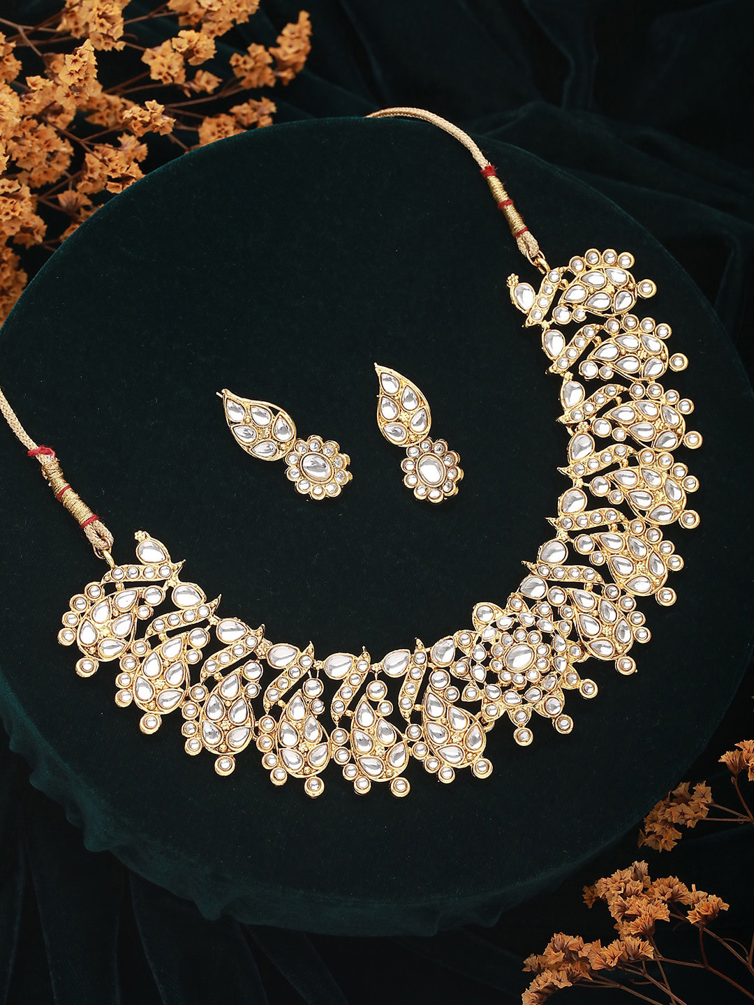 Jazz and Sizzle Gold-Plated Kundan-Studded Jewellery Set 
Jazz and Sizzle Gold-Plated Kundan-Studded Jewellery Set