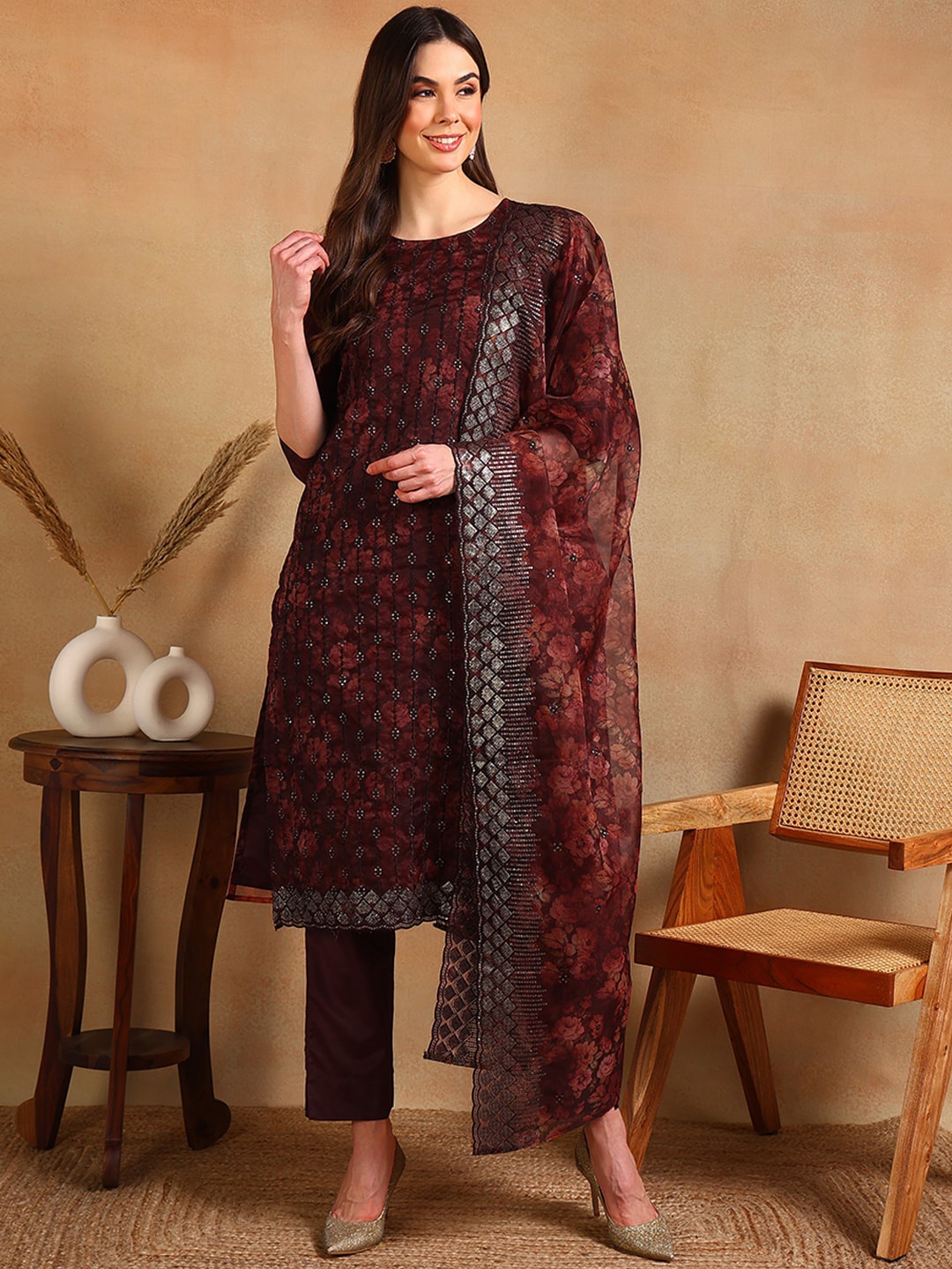 AHIKA Floral Printed Regular Sequinned Straight Kurta With Trousers & Dupatta, Brown
AHIKA Floral Printed Regular Sequinned Straight Kurta With Trousers & Dupatta, Brown
