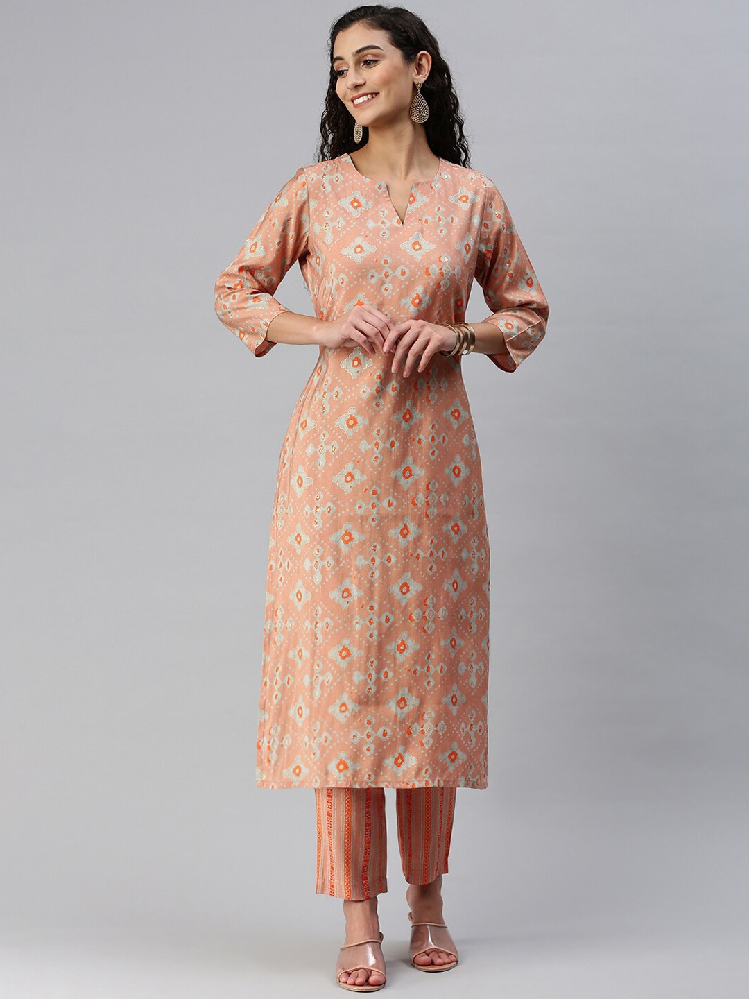 Shaily Abstract Printed Regular Thread Work Chanderi Cotton Kurta with Trousers, Peach
Shaily Abstract Printed Regular Thread Work Chanderi Cotton Kurta with Trousers, Peach