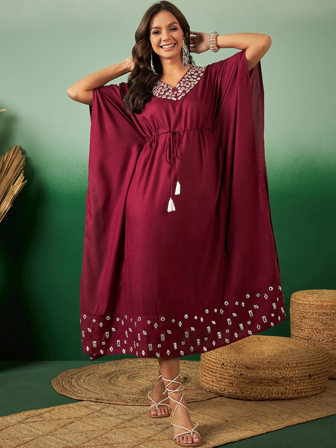 Sangria Embroidered Flared Sleeves Tie-Up Detail Mirror Work Kaftan Ethnic Dress, Maroon
Sangria Embroidered Flared Sleeves Tie-Up Detail Mirror Work Kaftan Ethnic Dress, Maroon