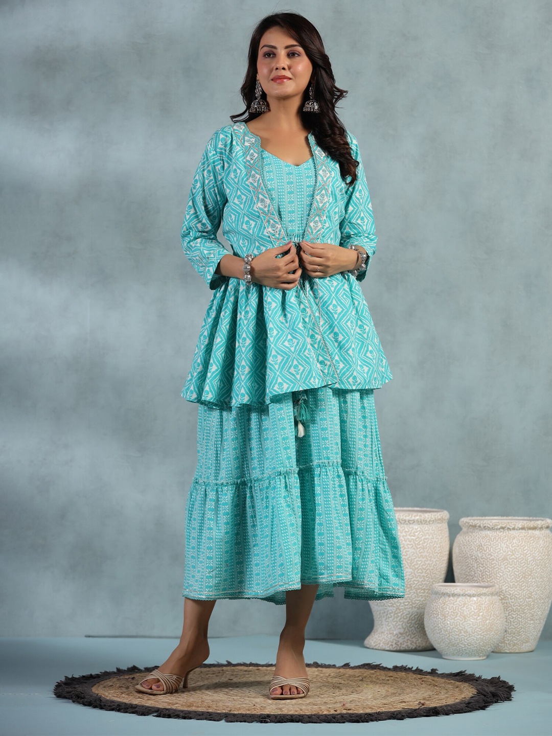 KALINI Ethnic Motifs Printed Tiered Pure Cotton Fit & Flare Midi Ethnic Dress with Jacket, Blue
KALINI Ethnic Motifs Printed Tiered Pure Cotton Fit & Flare Midi Ethnic Dress with Jacket, Blue