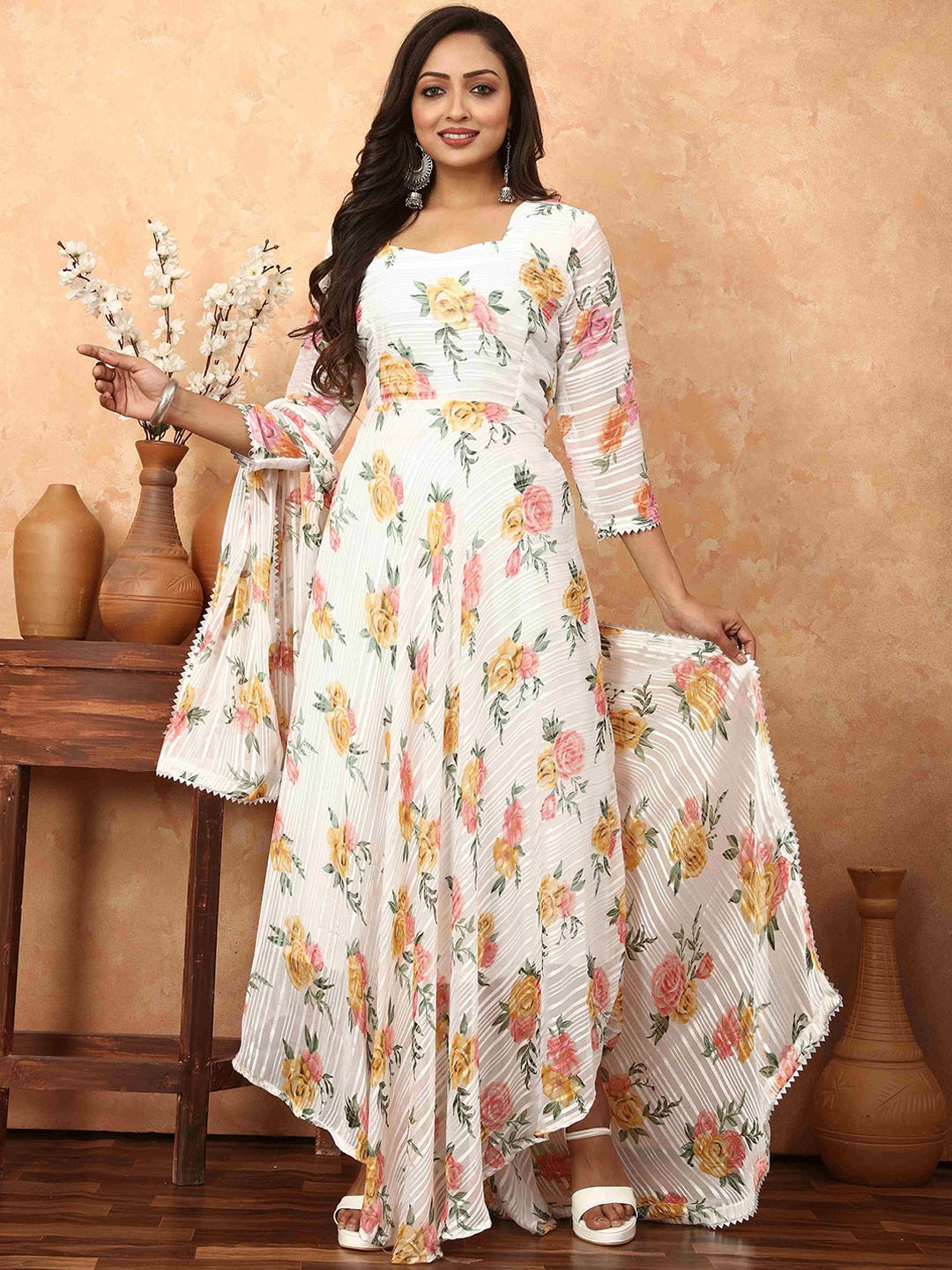 N N ENTERPRISE Floral Printed A-Line Georgette Kurta with Trousers & Dupatta, Off white
N N ENTERPRISE Floral Printed A-Line Georgette Kurta with Trousers & Dupatta, Off white