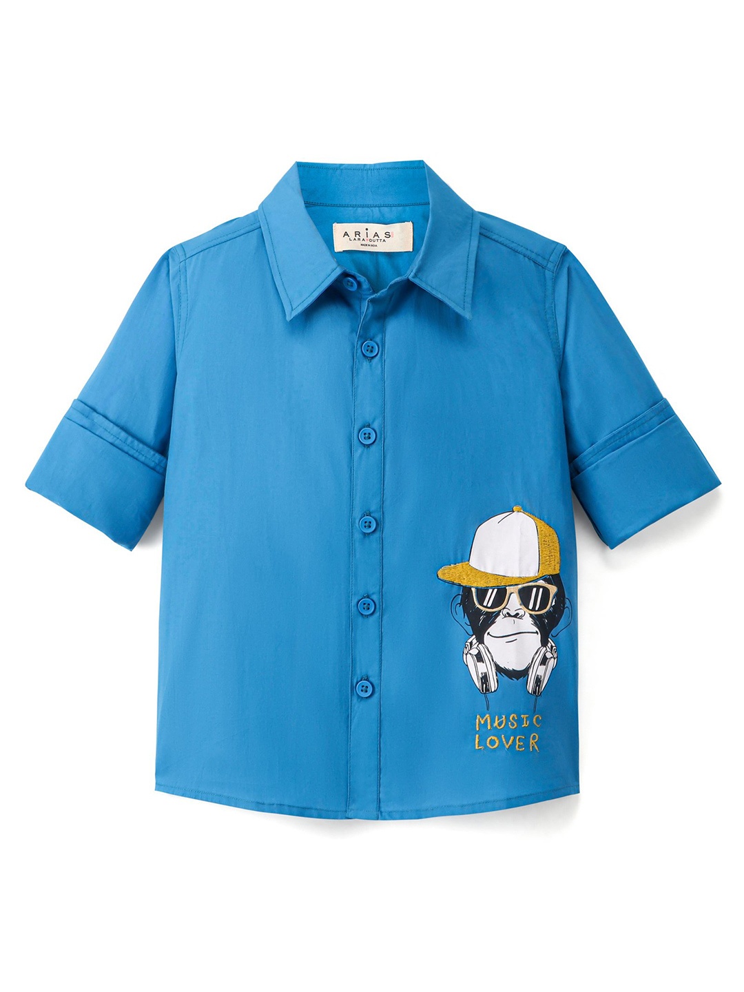 ARIAS By LARA DUTTA Boys Graphic Printed Cotton Spread Collar Curved Casual Shirt, Blue
ARIAS By LARA DUTTA Boys Graphic Printed Cotton Spread Collar Curved Casual Shirt, Blue