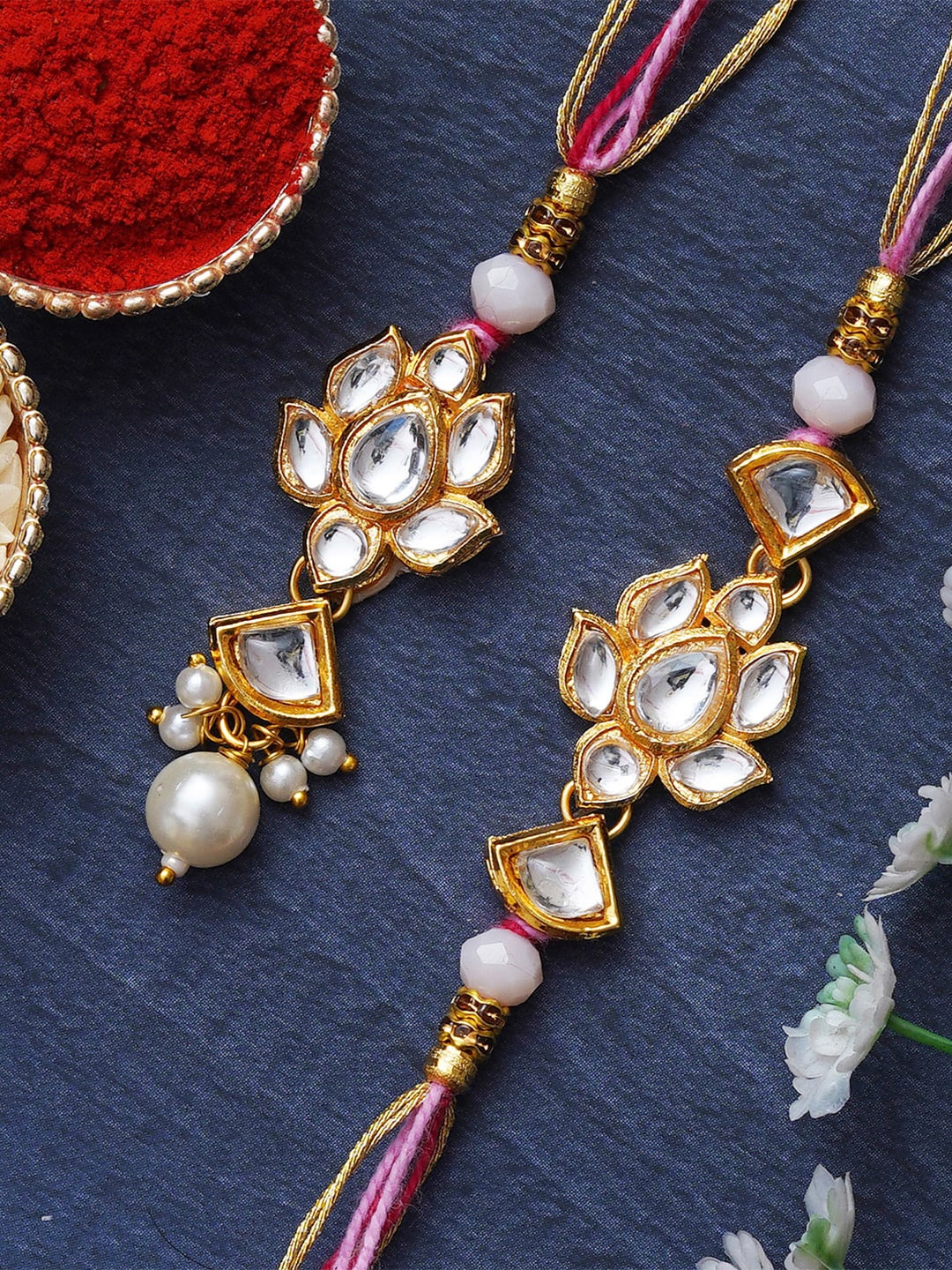 eCraftIndia Set of 2 Floral-Shaped Kundan Studded Bhaiya-Bhabhi Rakhis with Roli & Chawal, Multi
eCraftIndia Set of 2 Floral-Shaped Kundan Studded Bhaiya-Bhabhi Rakhis with Roli & Chawal, Multi