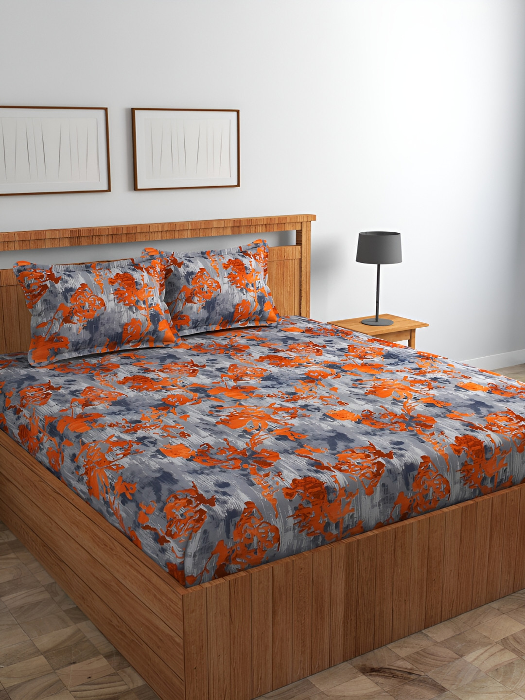 Srijee Decors Orange & Grey Floral 210 TC Cotton King Fitted Bedsheet with 2 Pillow Covers 
Srijee Decors Orange & Grey Floral 210 TC Cotton King Fitted Bedsheet with 2 Pillow Covers