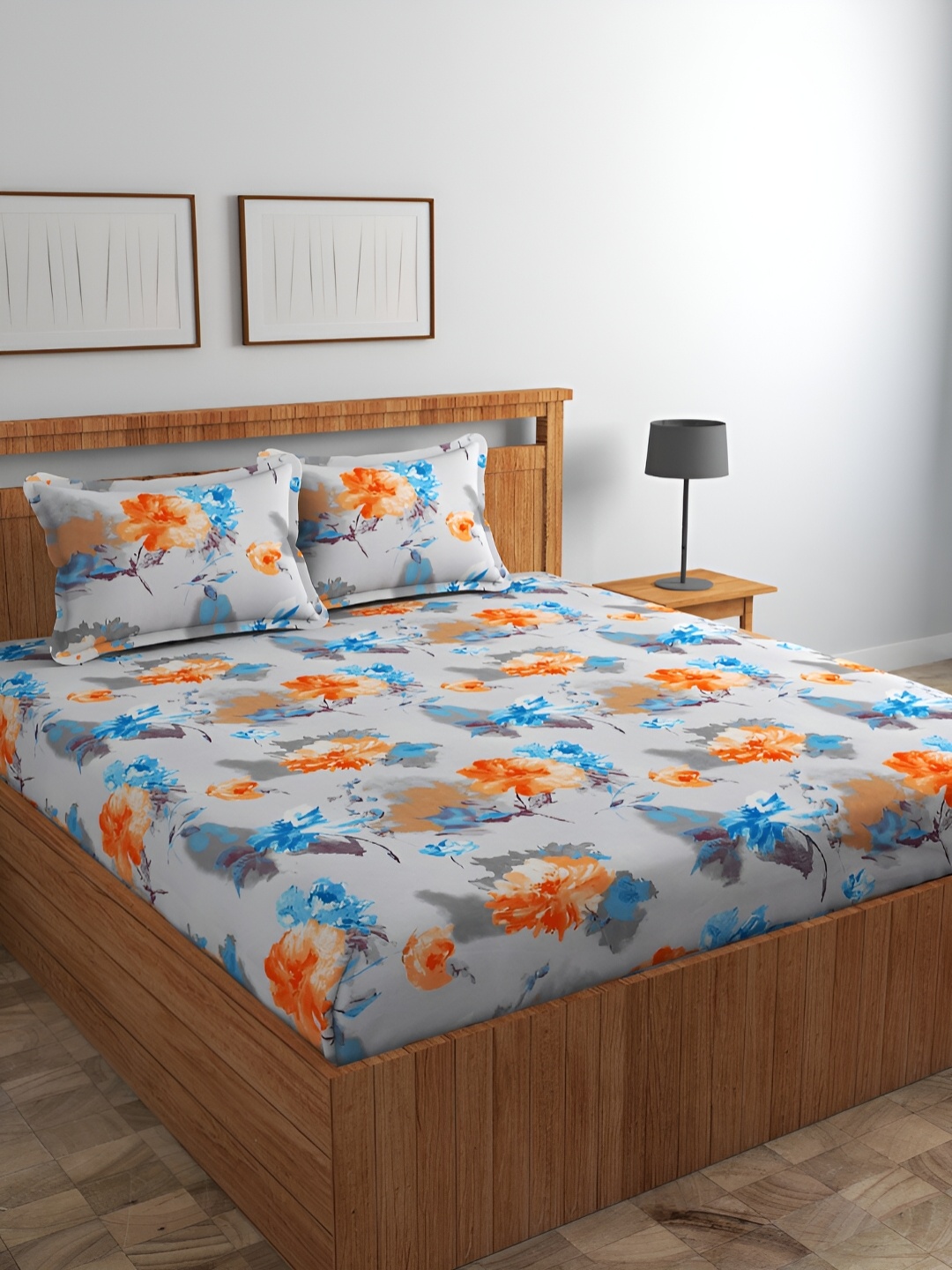 Srijee Decors Blue & Grey Floral 210 TC Cotton King Fitted Bedsheet with 2 Pillow Covers
Srijee Decors Blue & Grey Floral 210 TC Cotton King Fitted Bedsheet with 2 Pillow Covers