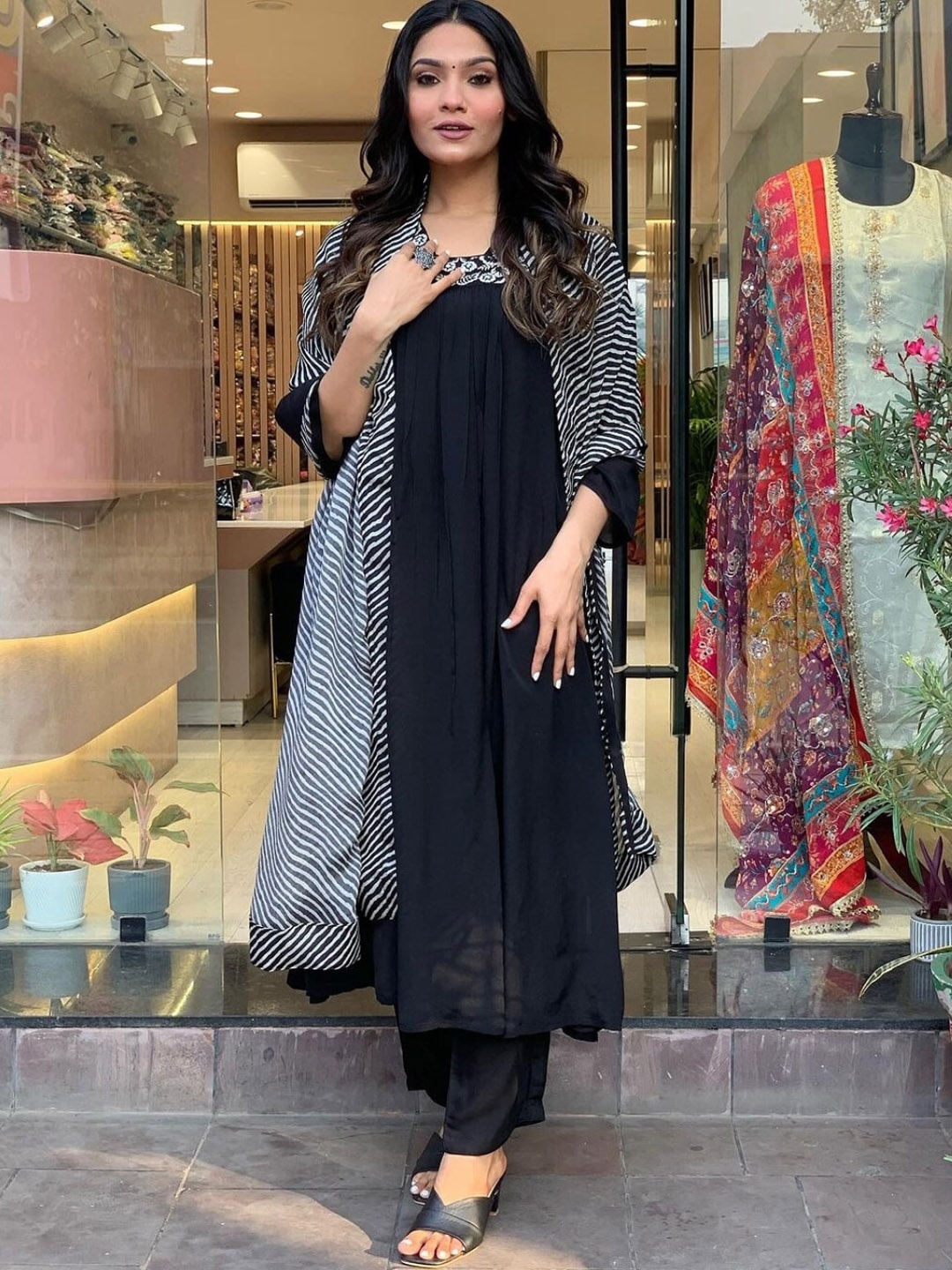 KALINI Ethnic Motifs Yoke Design Thread Work Detailed A-Line Kurta & Trouser With Dupatta, Black
KALINI Ethnic Motifs Yoke Design Thread Work Detailed A-Line Kurta & Trouser With Dupatta, Black
