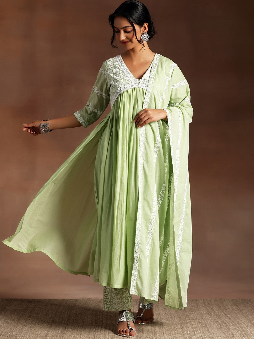 Libas Ethnic Motifs High Slit Thread Work Pure Cotton Kurta with Palazzos & Dupatta, Green
Libas Ethnic Motifs High Slit Thread Work Pure Cotton Kurta with Palazzos & Dupatta, Green