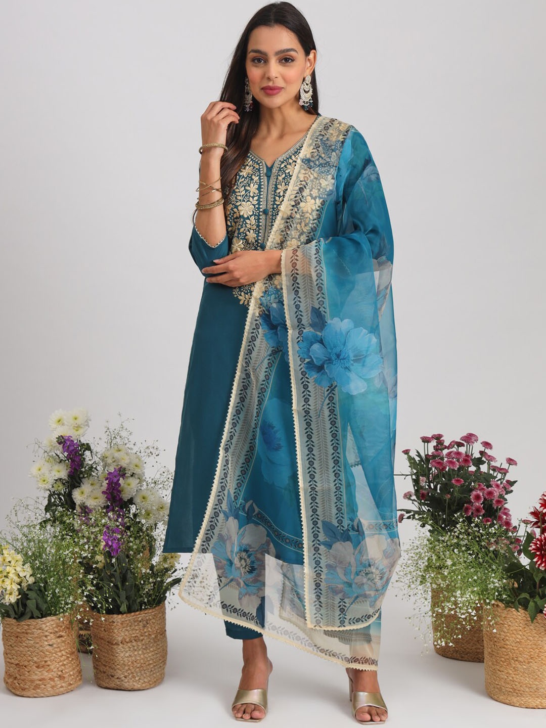 Tikhi Imli Teal Blue Floral Yoke Design Thread Work Straight Kurta With Trousers & Dupatta
Tikhi Imli Teal Blue Floral Yoke Design Thread Work Straight Kurta With Trousers & Dupatta