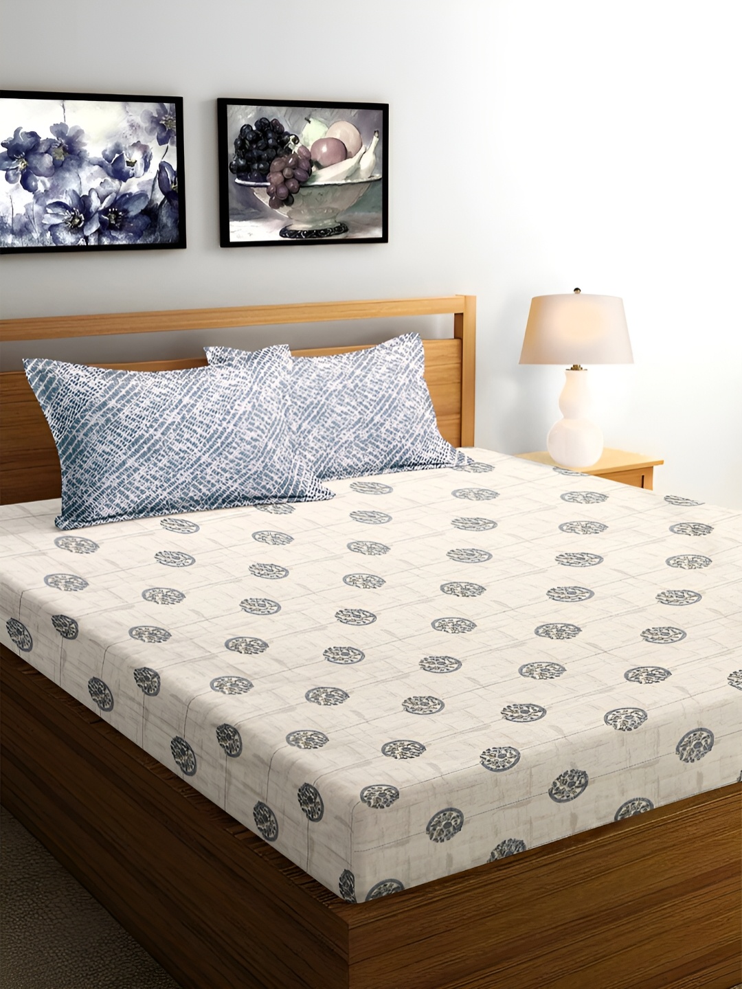 Srijee Decors Blue Ethnic Motifs 250 TC Cotton Fitted King Bedsheet & Pillow Covers
Srijee Decors Blue Ethnic Motifs 250 TC Cotton Fitted King Bedsheet & Pillow Covers