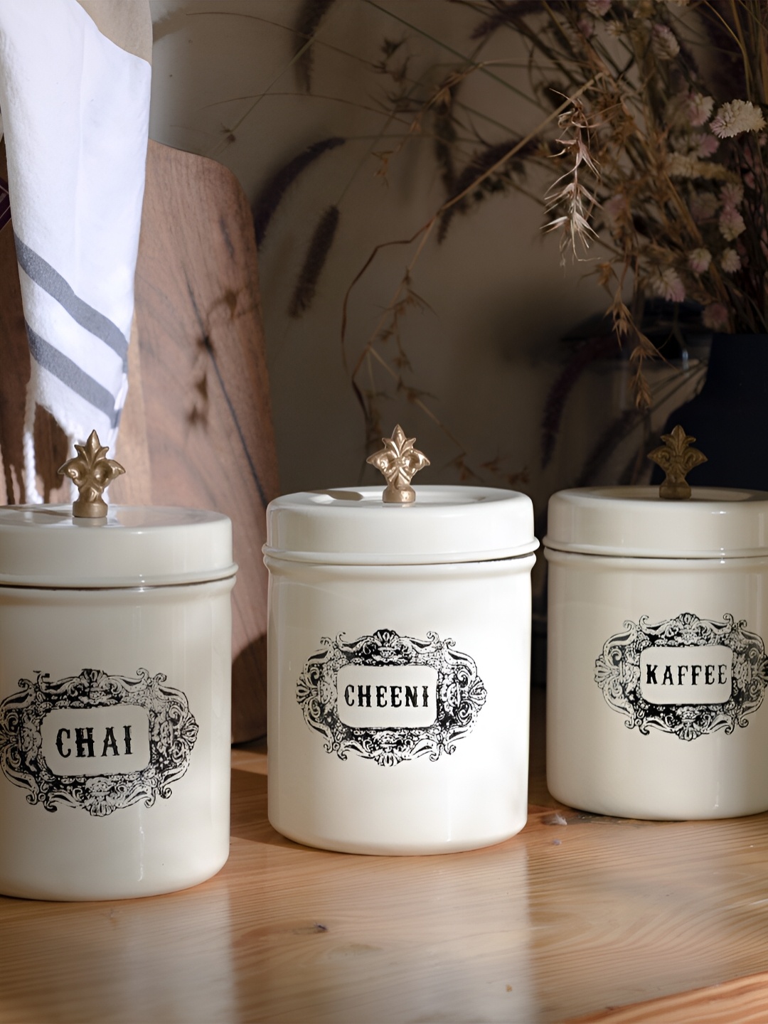 Living With Elan Off White & Black 3 Pieces Printed Stainless Steel Canister
Living With Elan Off White & Black 3 Pieces Printed Stainless Steel Canister