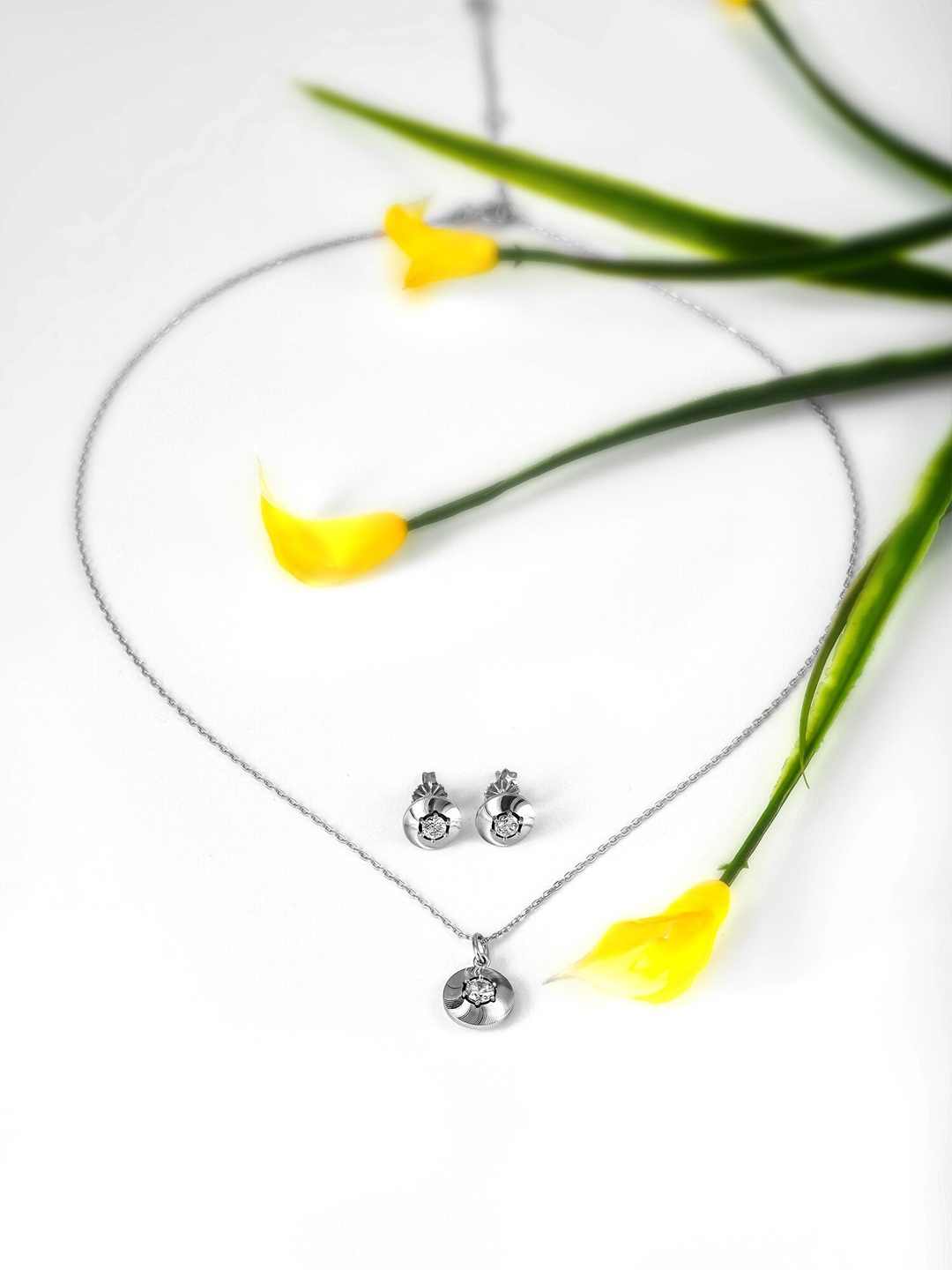 SILBERRY 925 Sterling Silver Rhodium Plated Cubic Zirconia Studded Pendant and Earrings
SILBERRY 925 Sterling Silver Rhodium Plated Cubic Zirconia Studded Pendant and Earrings