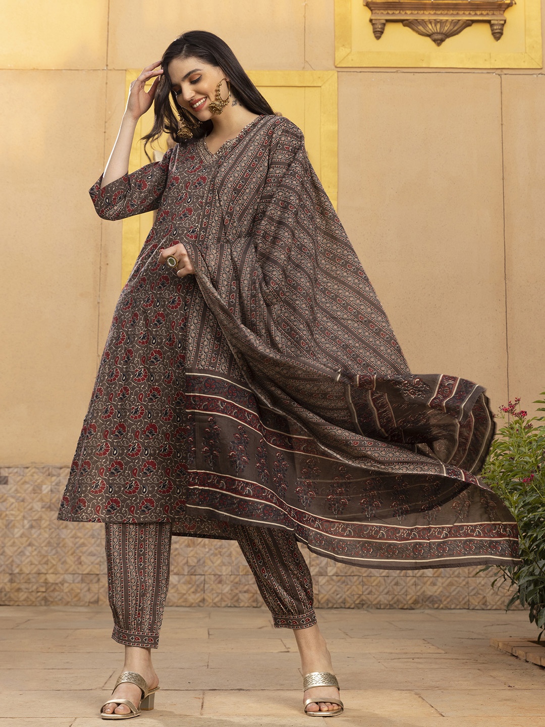 Ishin Kalamkari Printed Zari embroidered Cotton Kurta with Trouser & Cotton Dupatta, Brown
Ishin Kalamkari Printed Zari embroidered Cotton Kurta with Trouser & Cotton Dupatta, Brown