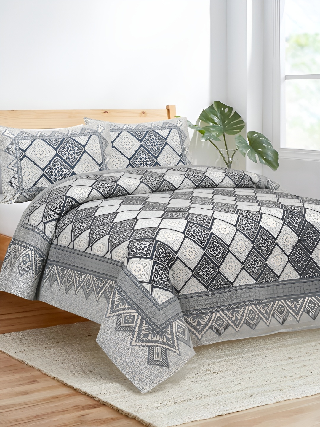 JAIPUR FABRIC White & Grey Ethnic Motifs 180 TC King Bedsheet with 2 Pillow Covers
JAIPUR FABRIC White & Grey Ethnic Motifs 180 TC King Bedsheet with 2 Pillow Covers