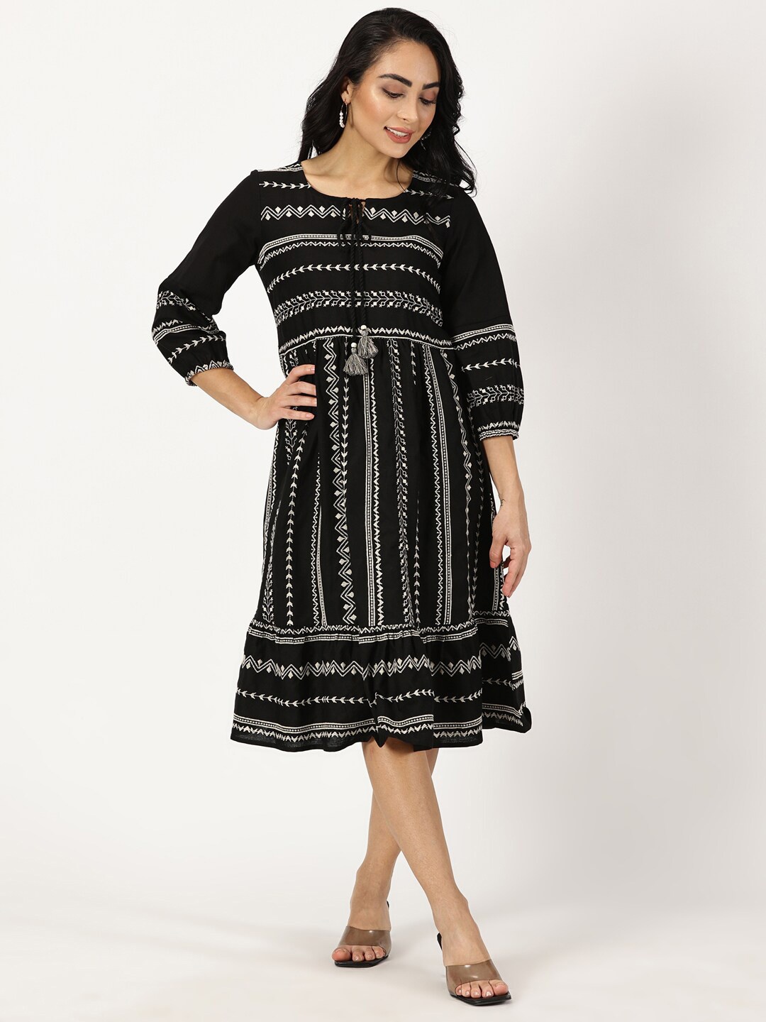 Saffron Threads Ethnic Motifs Embroidered Tie Up Neck Cotton & Linen A-Line Midi Dress, Black
Saffron Threads Ethnic Motifs Embroidered Tie Up Neck Cotton & Linen A-Line Midi Dress, Black