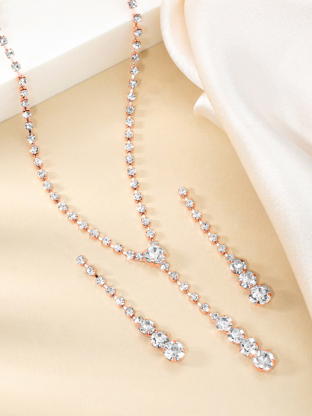 Peora Rose Gold-Plated Cubic Zirconia-Studded Jewellery Set 
Peora Rose Gold-Plated Cubic Zirconia-Studded Jewellery Set