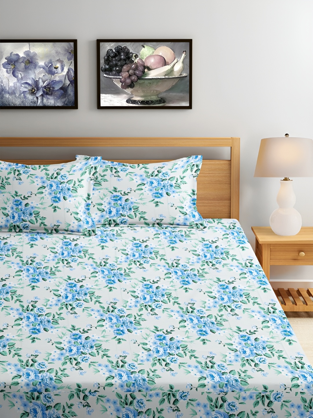 Srijee Decors Blue & White Floral Printed Cotton 300 TC King Bedsheet With 2 Pillow Covers
Srijee Decors Blue & White Floral Printed Cotton 300 TC King Bedsheet With 2 Pillow Covers