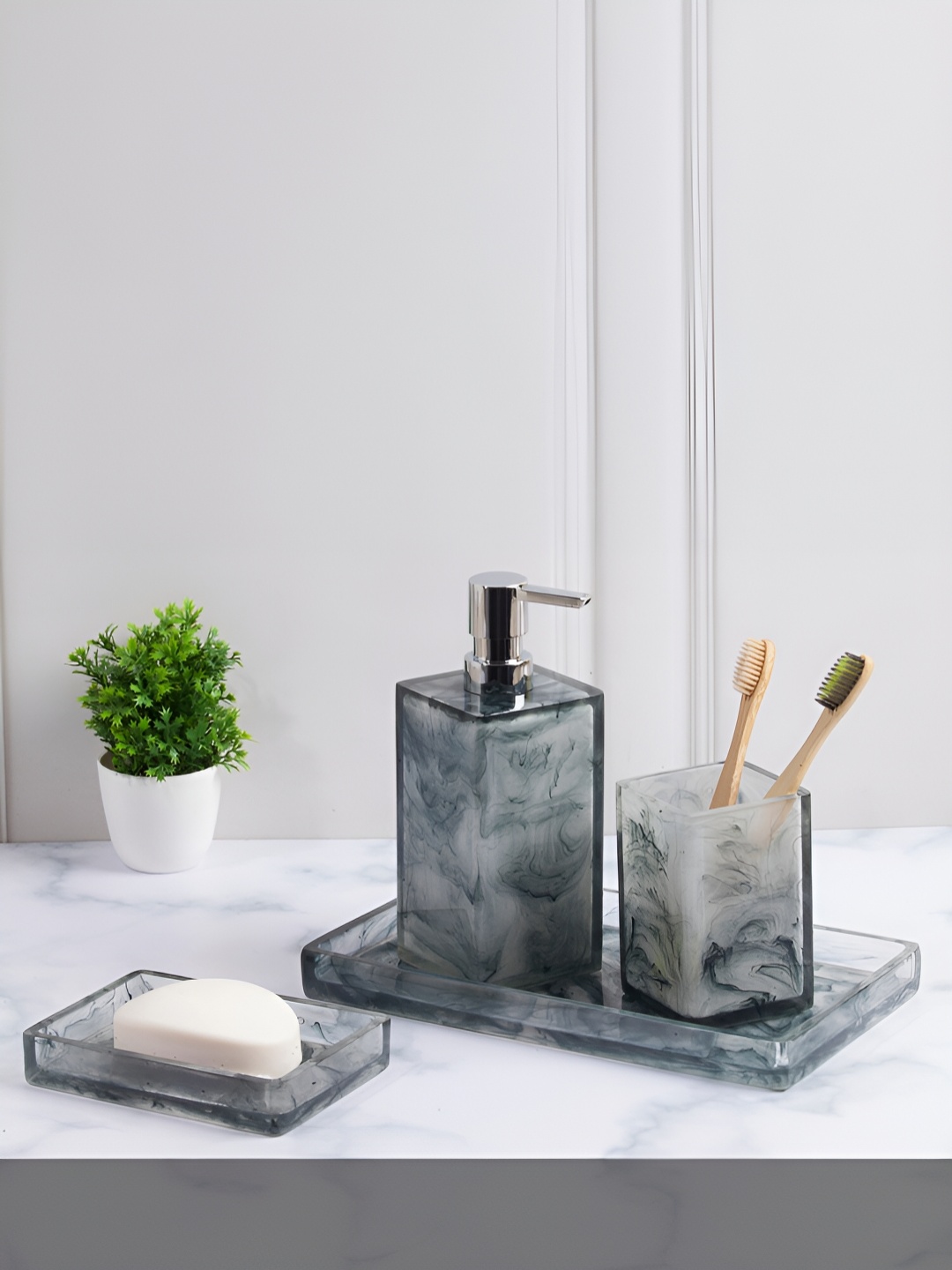 OBSESSIONS Blue & White 4 pieces Abstract Polyresin Bath Accessories Set
OBSESSIONS Blue & White 4 pieces Abstract Polyresin Bath Accessories Set