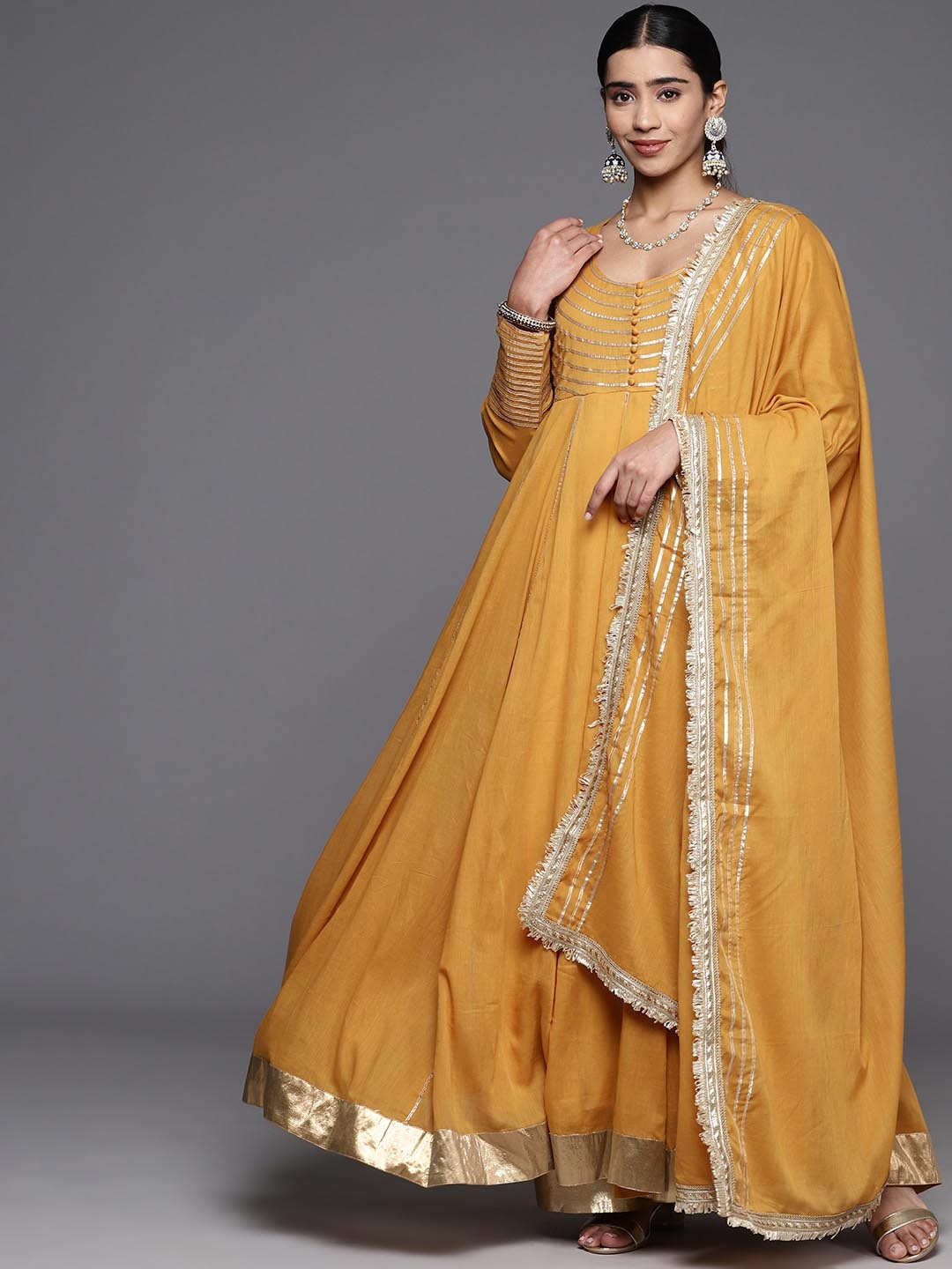Mitera Gotta Patti Embellished Empire Anarkali Kurta With Trousers & Duppatta, Mustard
Mitera Gotta Patti Embellished Empire Anarkali Kurta With Trousers & Duppatta, Mustard