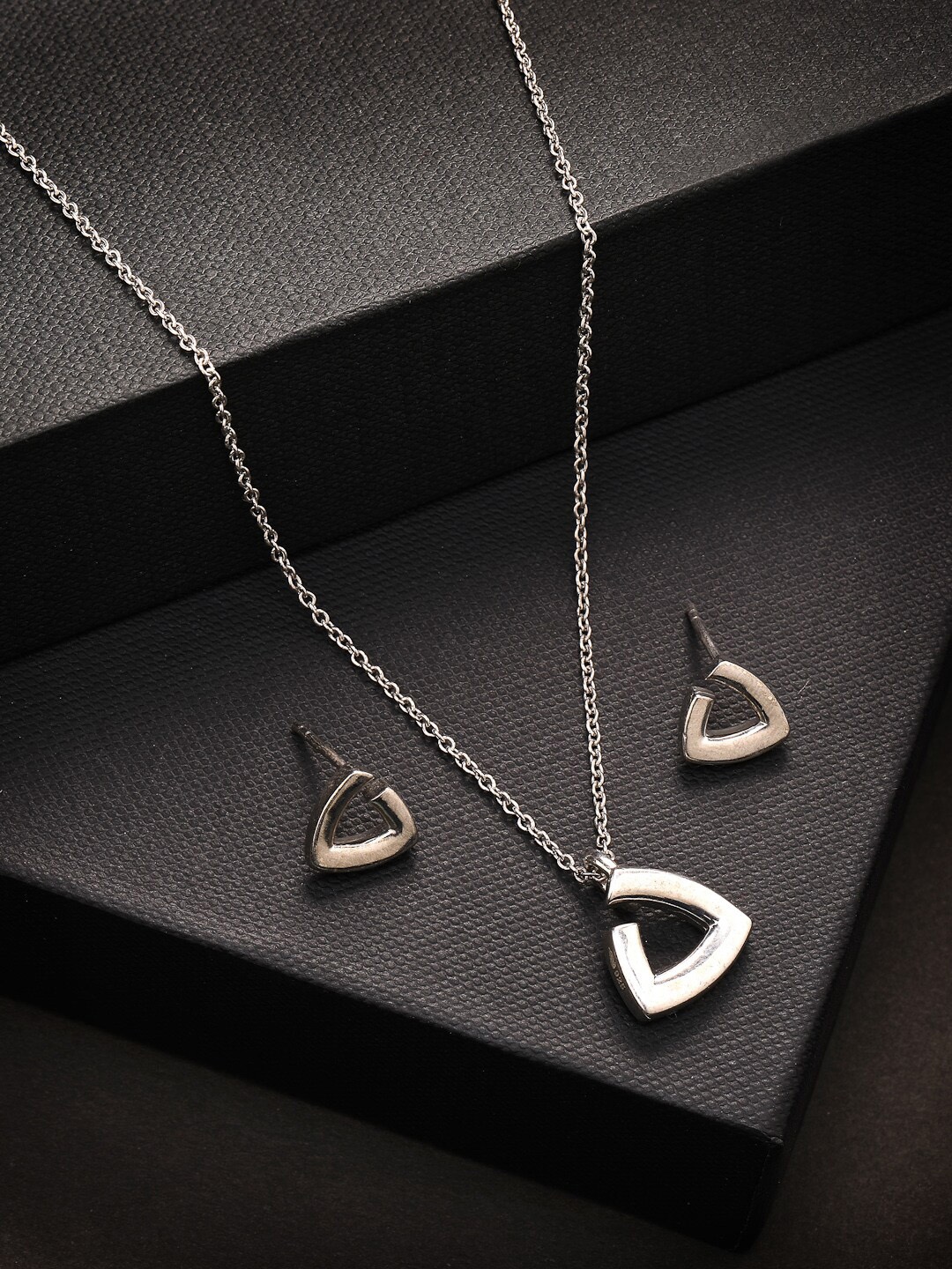 PRIONI 925 Sterling Silver Rhodium-Plated Triangle Shaped Studded Jewellery Set
PRIONI 925 Sterling Silver Rhodium-Plated Triangle Shaped Studded Jewellery Set