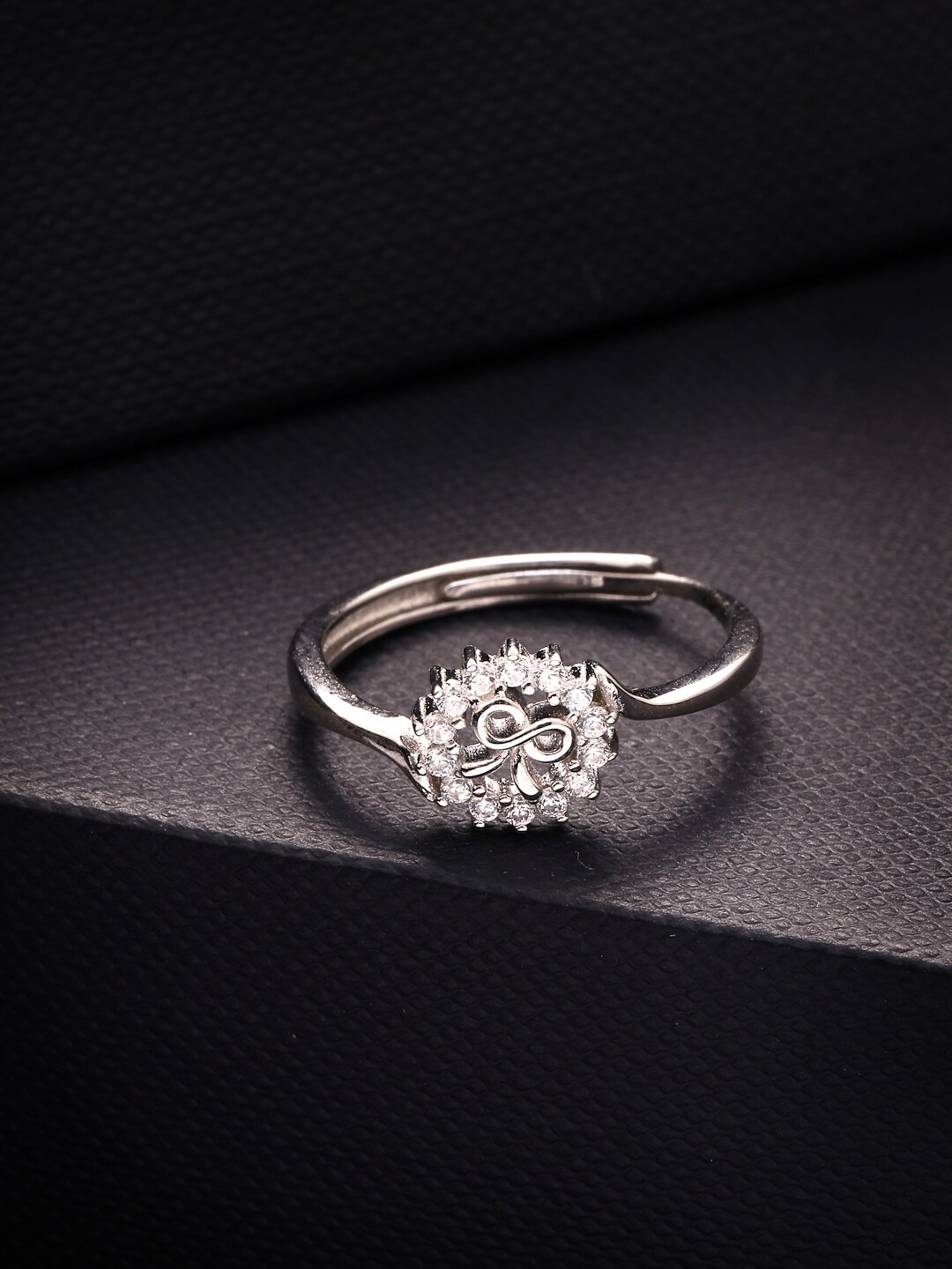 PRIONI Rhodium-Plated 925 Sterling Silver Cubic Zirconia-Studded Adjustable Finger Ring
PRIONI Rhodium-Plated 925 Sterling Silver Cubic Zirconia-Studded Adjustable Finger Ring