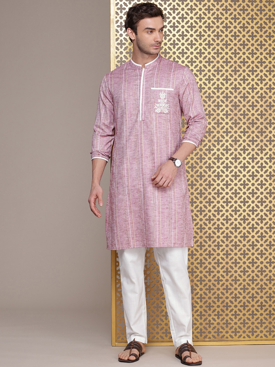 House of Pataudi Men Jashn Striped Floral Thread Work Kurta With Trousers, Mauve
House of Pataudi Men Jashn Striped Floral Thread Work Kurta With Trousers, Mauve