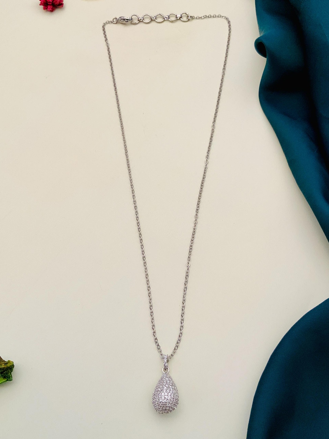 DressBerry Silver-Toned Silver-Plated American Diamond Teardrop Shaped Pendant With Chain
DressBerry Silver-Toned Silver-Plated American Diamond Teardrop Shaped Pendant With Chain