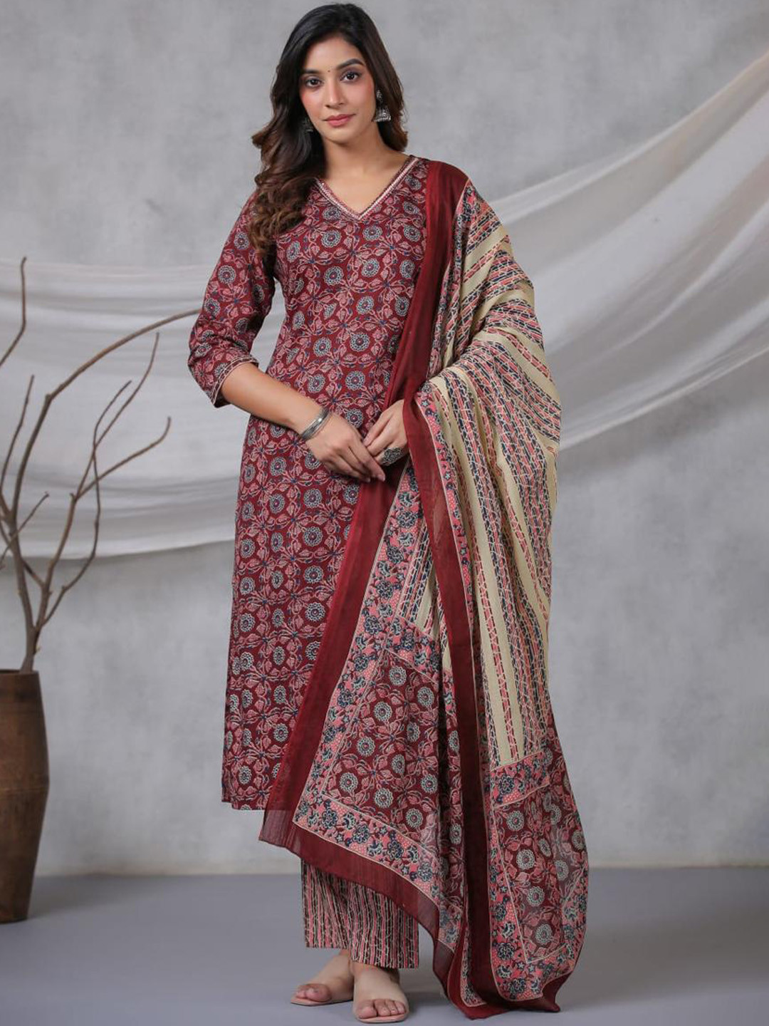KALINI Floral Printed V-Neck Thread Work Pure Cotton Kurta with Trousers & Dupatta, Maroon
KALINI Floral Printed V-Neck Thread Work Pure Cotton Kurta with Trousers & Dupatta, Maroon