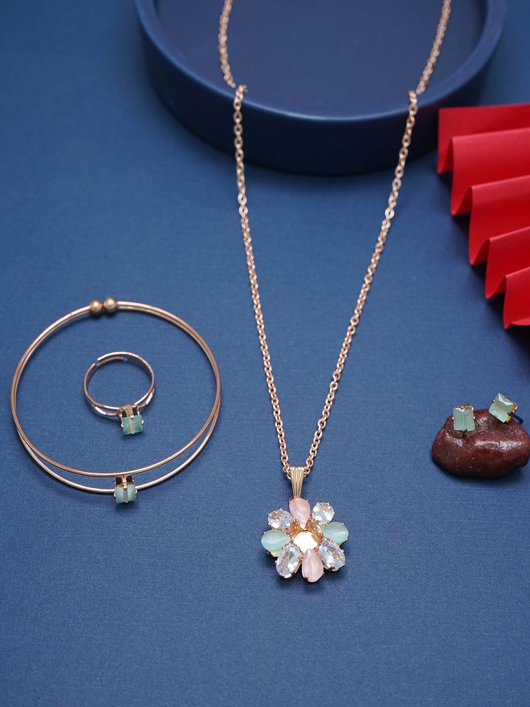 Ramdev Art Fashion Jwellery Set Of 4 American Diamond Studded Jewellery Set, Rose gold
Ramdev Art Fashion Jwellery Set Of 4 American Diamond Studded Jewellery Set, Rose gold