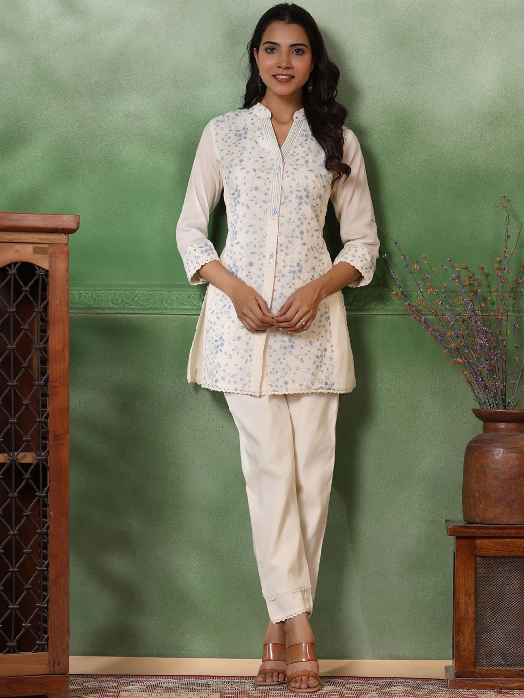 FASHOR Floral Embroidered Mandarin Collar Sequinned A-Line Kurti with Trousers, Off white
FASHOR Floral Embroidered Mandarin Collar Sequinned A-Line Kurti with Trousers, Off white