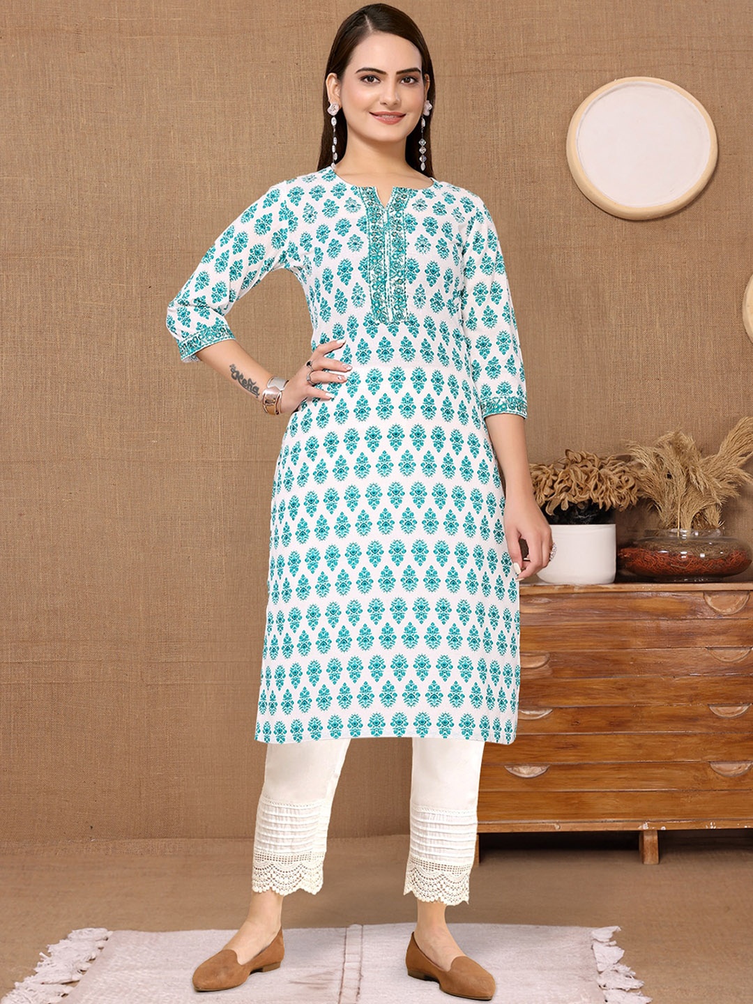 Rangita Ethnic Motifs Embroidered Mirror Work Pure Cotton Straight Kurta with Trousers, Turquoise blue
Rangita Ethnic Motifs Embroidered Mirror Work Pure Cotton Straight Kurta with Trousers, Turquoise blue