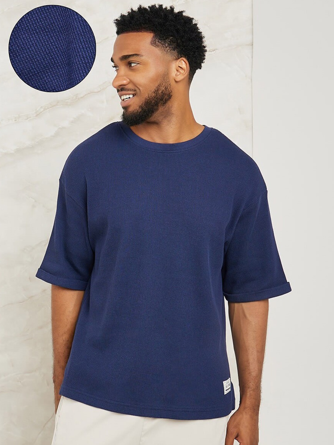 Styli Waffle Knit Drop-Shoulder Sleeves Cotton Oversized T-shirt with Turn Up Sleeves, Navy blue
Styli Waffle Knit Drop-Shoulder Sleeves Cotton Oversized T-shirt with Turn Up Sleeves, Navy blue
