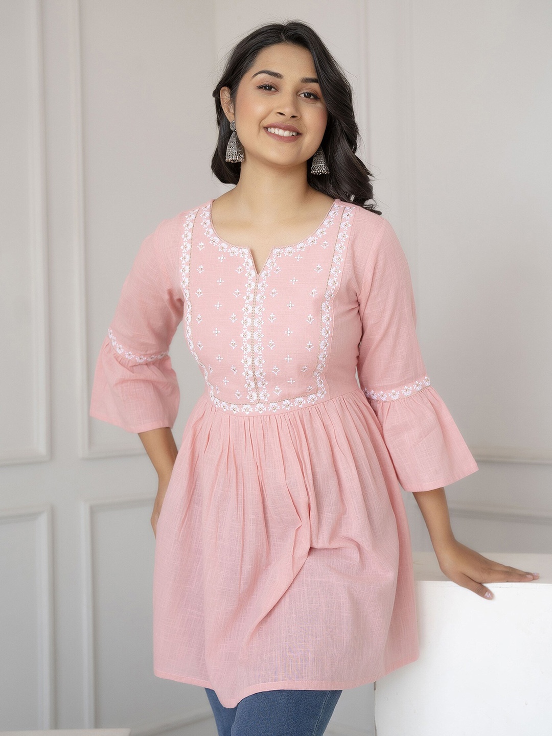 Nayo Pink Floral Embroidered Notch Neck Flared Sleeves Pure Cotton Peplum Short Kurti
Nayo Pink Floral Embroidered Notch Neck Flared Sleeves Pure Cotton Peplum Short Kurti