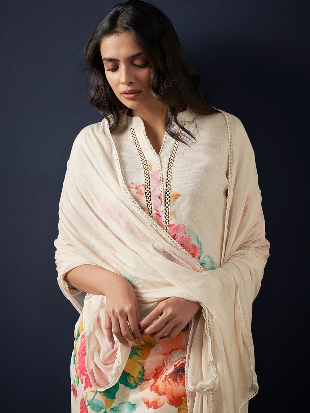 Indo Era Floral Printed Beads and Stones Linen Straight Kurta with Trousers & Dupatta, Off white
Indo Era Floral Printed Beads and Stones Linen Straight Kurta with Trousers & Dupatta, Off white
