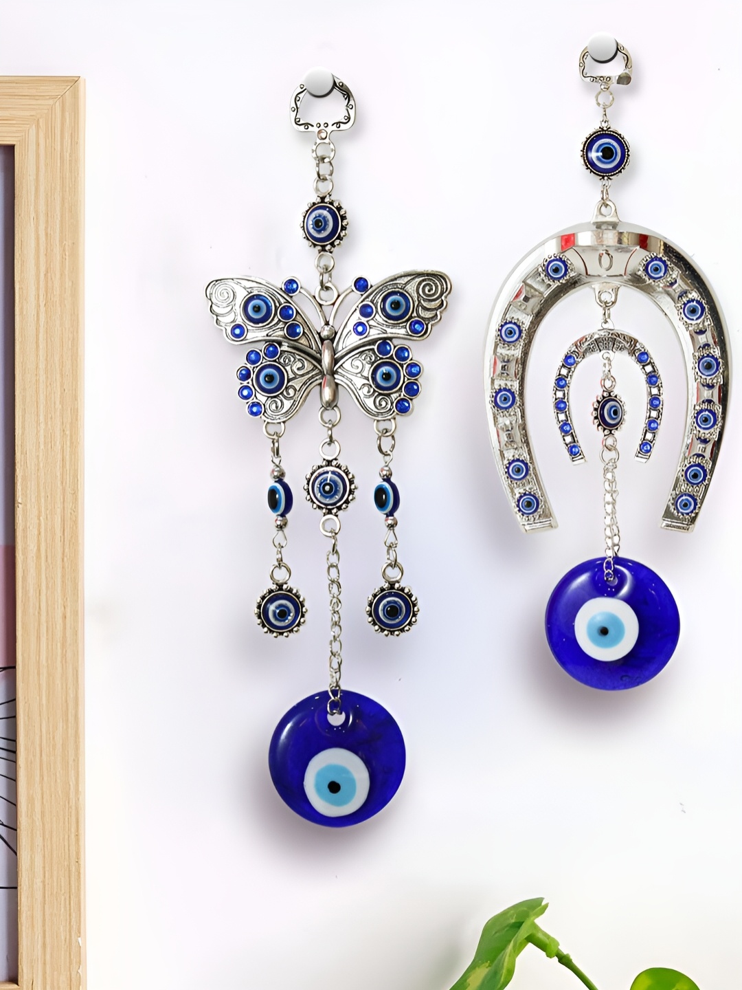 TIED RIBBONS Blue 2 Pcs Horse Shoe & Butterfly Pendant Evil Eye Metal Wall Hangings, Silver
TIED RIBBONS Blue 2 Pcs Horse Shoe & Butterfly Pendant Evil Eye Metal Wall Hangings, Silver