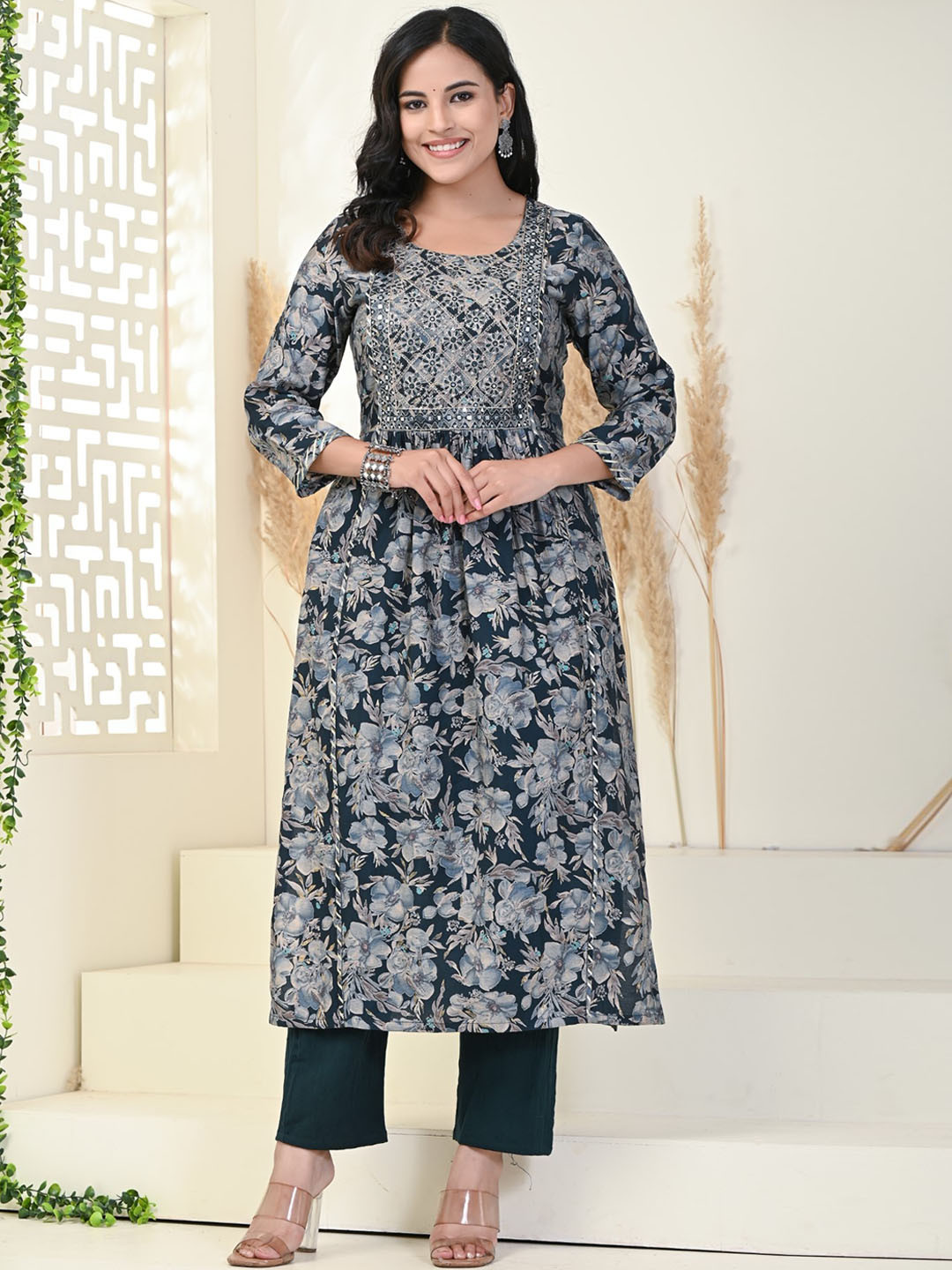 KALINI Floral Printed Empire Mirror Work Pure Cotton Anarkali Kurta with Trousers, Blue
KALINI Floral Printed Empire Mirror Work Pure Cotton Anarkali Kurta with Trousers, Blue