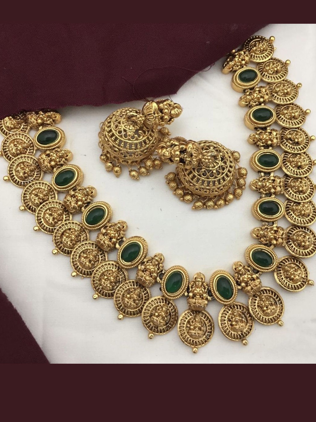 Adc fashions Gold-Plated Artificial Stones Studded Temple Necklace Earrings Set, Green
Adc fashions Gold-Plated Artificial Stones Studded Temple Necklace Earrings Set, Green